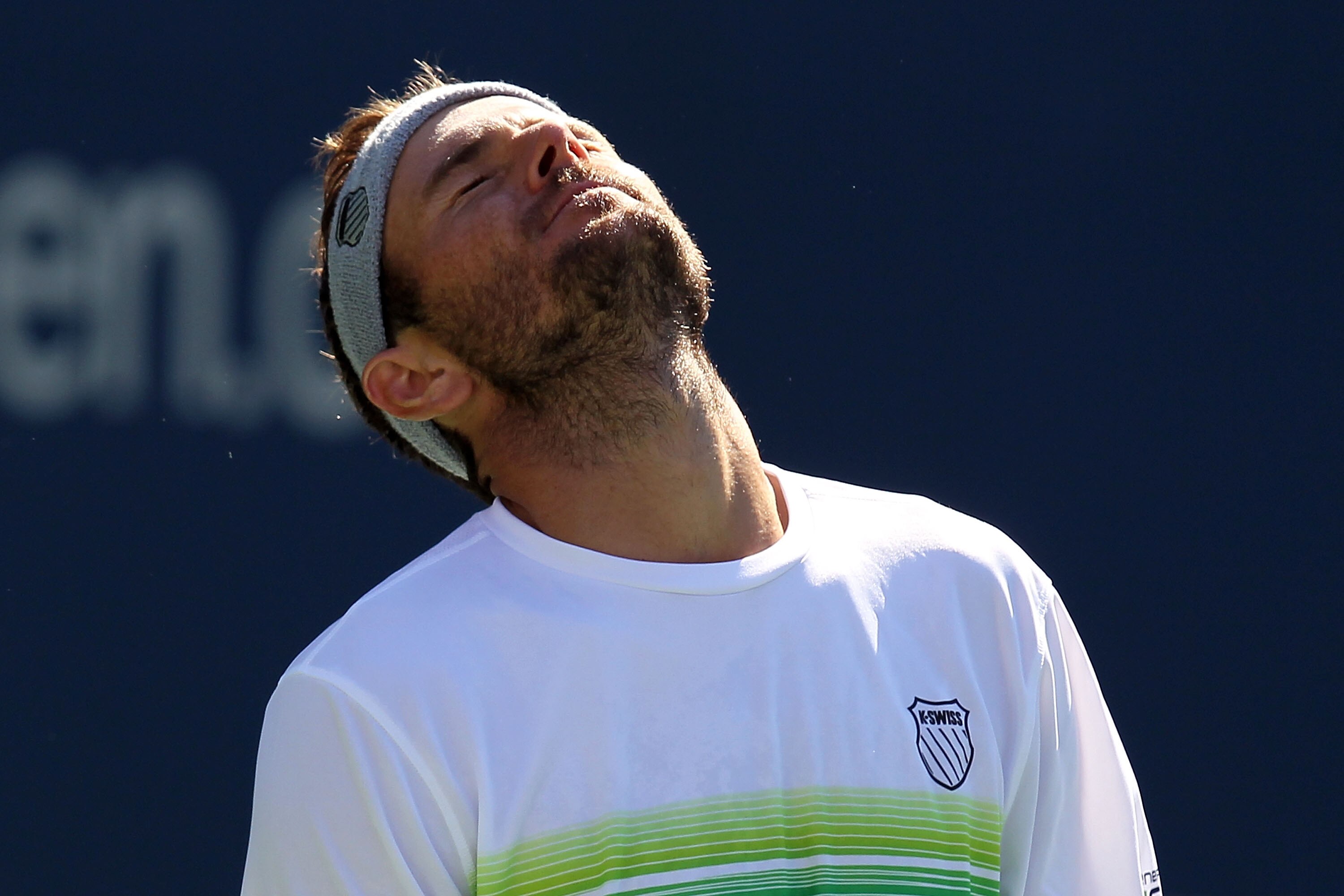 NEW YORK - SEPTEMBER 06:  Mardy Fish of the United States reacts after a point played against Novak Djokovic of Serbia during the men's singles match on day eight of the 2010 U.S. Open at the USTA Billie Jean King National Tennis Center on September 6, 20