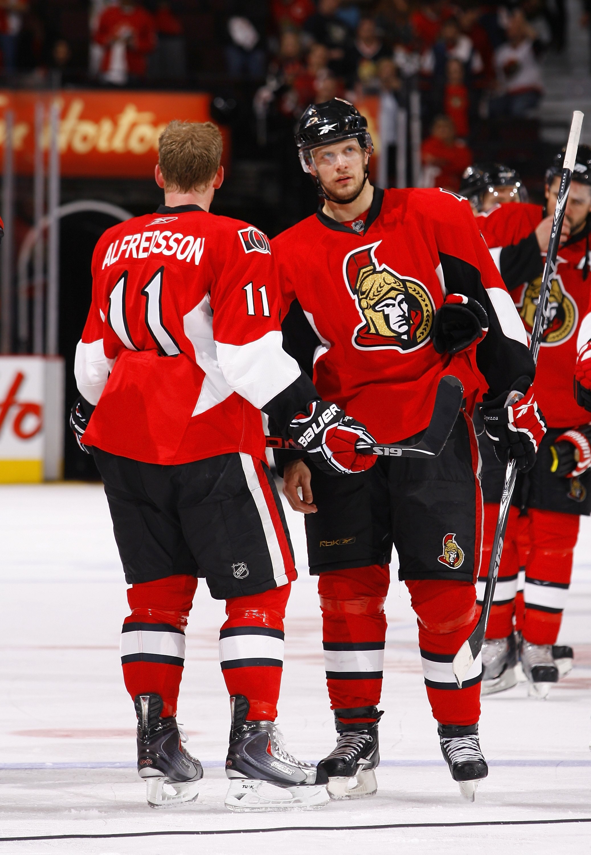 OTTAWA, ON - APRIL 24:  Jason Spezza #19 and Daniel Alfredsson #11 of the Ottawa Senators talk during a break in action against the Pittsburgh Penguins in Game 6 of the Eastern Conference Quaterfinals of the 2010 Stanley Cup Playoffs at Scotiabank Place o