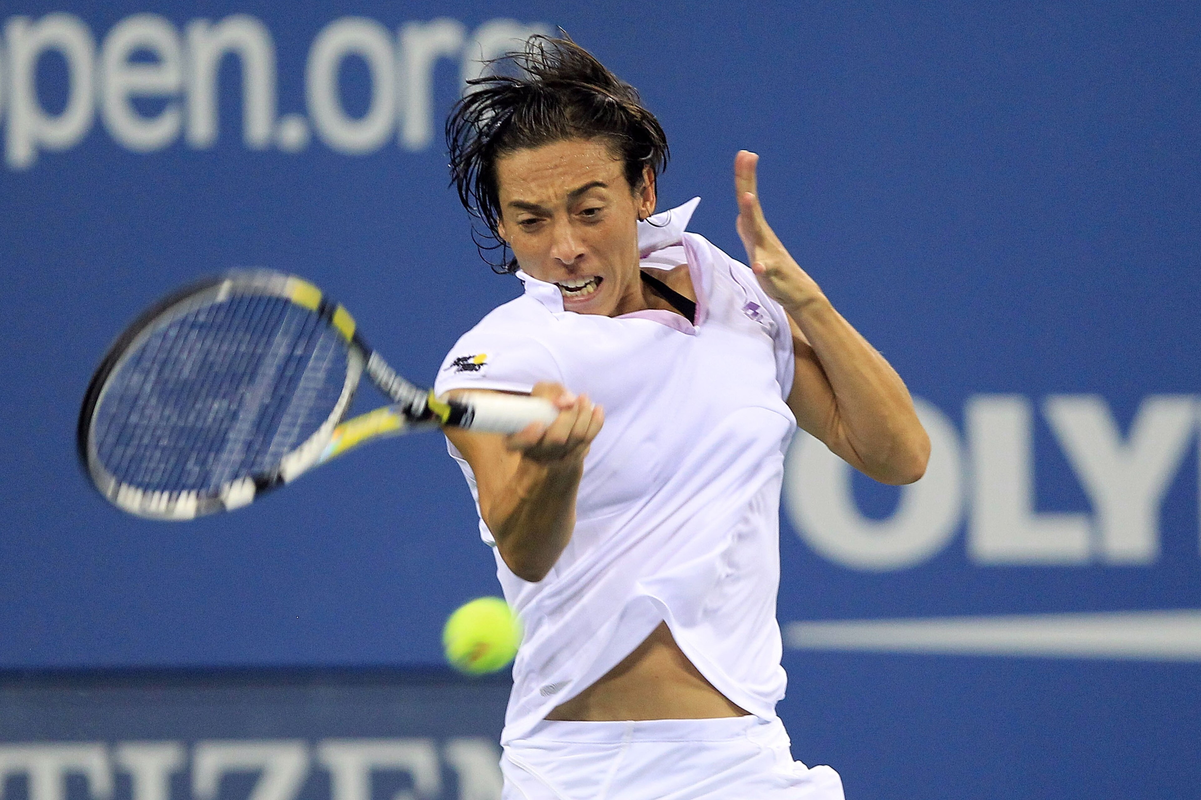 NEW YORK - SEPTEMBER 07:  Francesca Schiavone of Italy hits a return against Venus Williams of the United States during day nine of the 2010 U.S. Open at the USTA Billie Jean King National Tennis Center on September 7, 2010 in the Flushing neighborhood of
