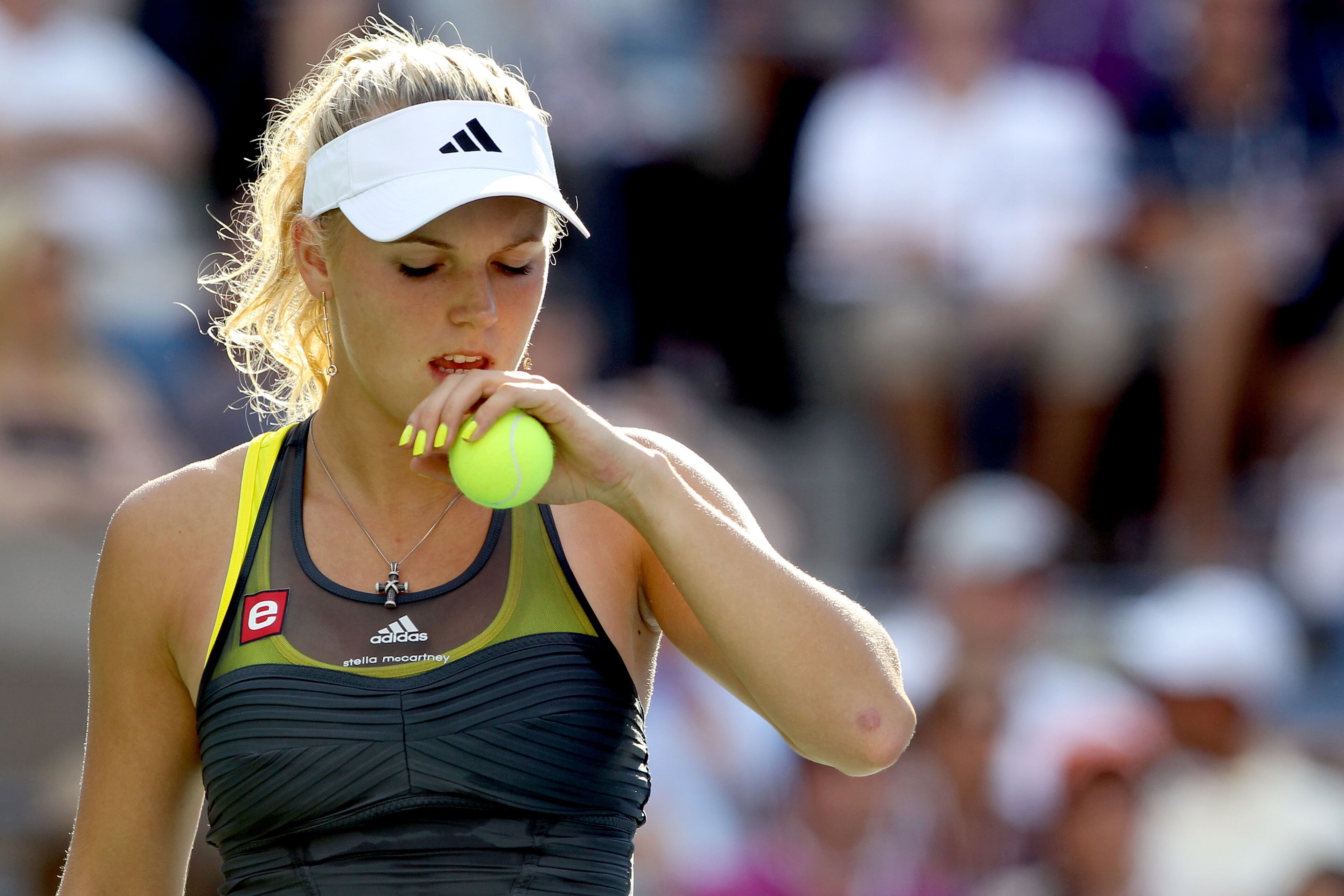 NEW YORK - SEPTEMBER 06:  Caroline Wozniacki of Denmark readies herself to serve against Maria Sharapova of Russia during the women's singles match on day eight of the 2010 U.S. Open at the USTA Billie Jean King National Tennis Center on September 6, 2010