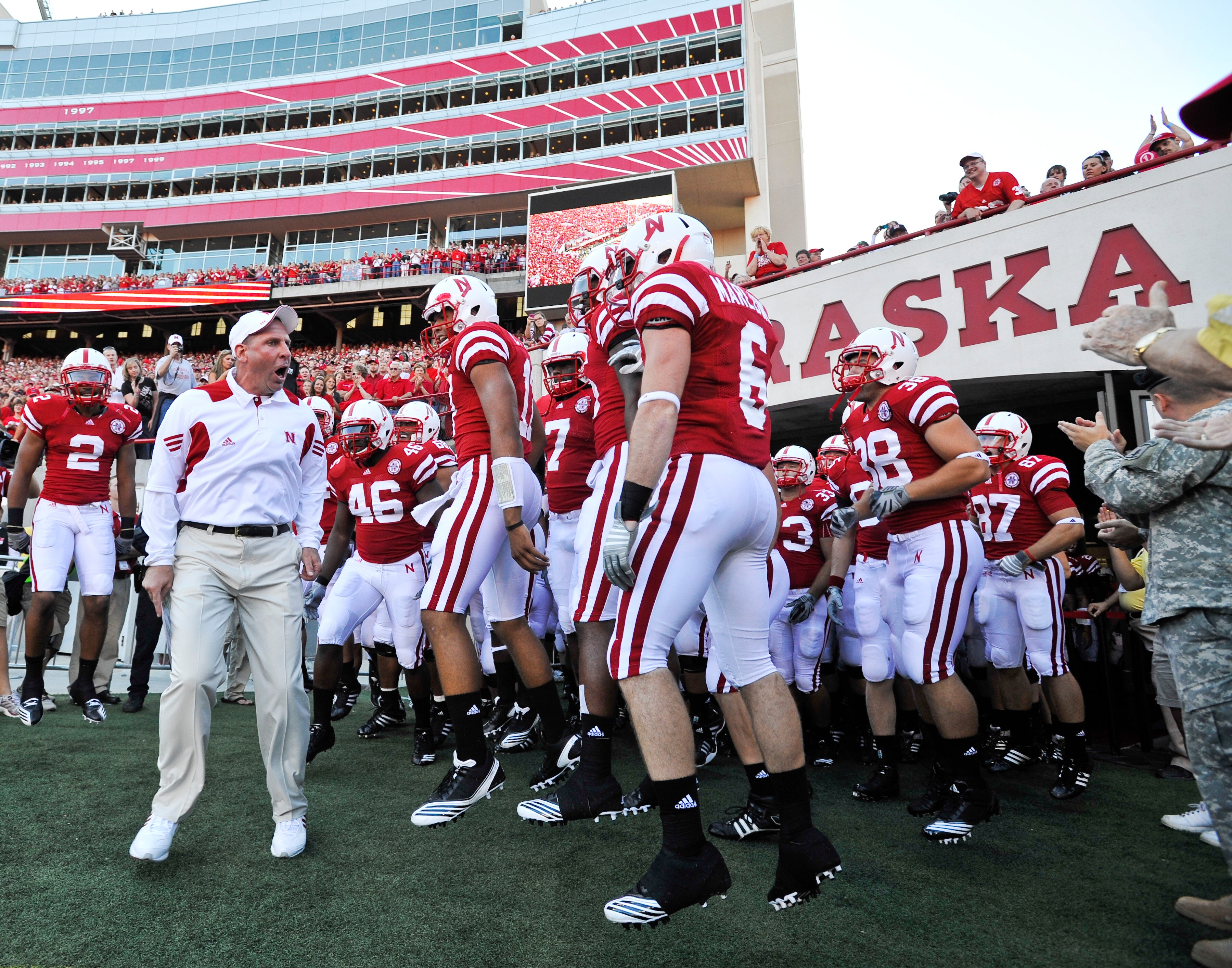LINCOLN, NE - SEPTEMBER 04:  Head Coach Bo Pelini pumps up his Nebraska Cornhuskers before their season opener against the Western Kentucky Hilltoppers at Memorial Stadium on September 4, 2010 in Lincoln, Nebraska. Nebraska defeated Western Kentucky 49-10