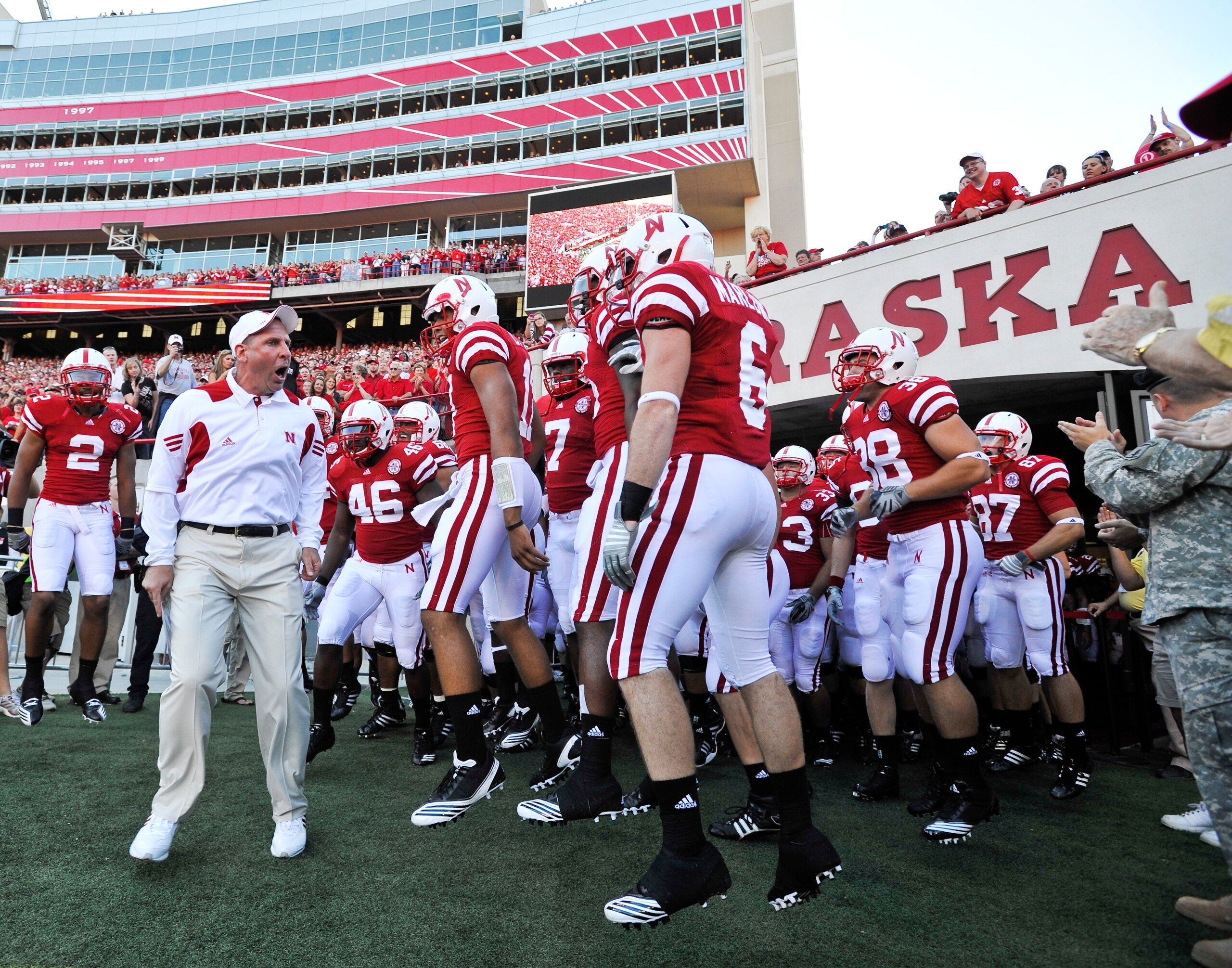 LINCOLN, NE - SEPTEMBER 04:  Head Coach Bo Pelini pumps up his Nebraska Cornhuskers before their season opener against the Western Kentucky Hilltoppers at Memorial Stadium on September 4, 2010 in Lincoln, Nebraska. Nebraska defeated Western Kentucky 49-10