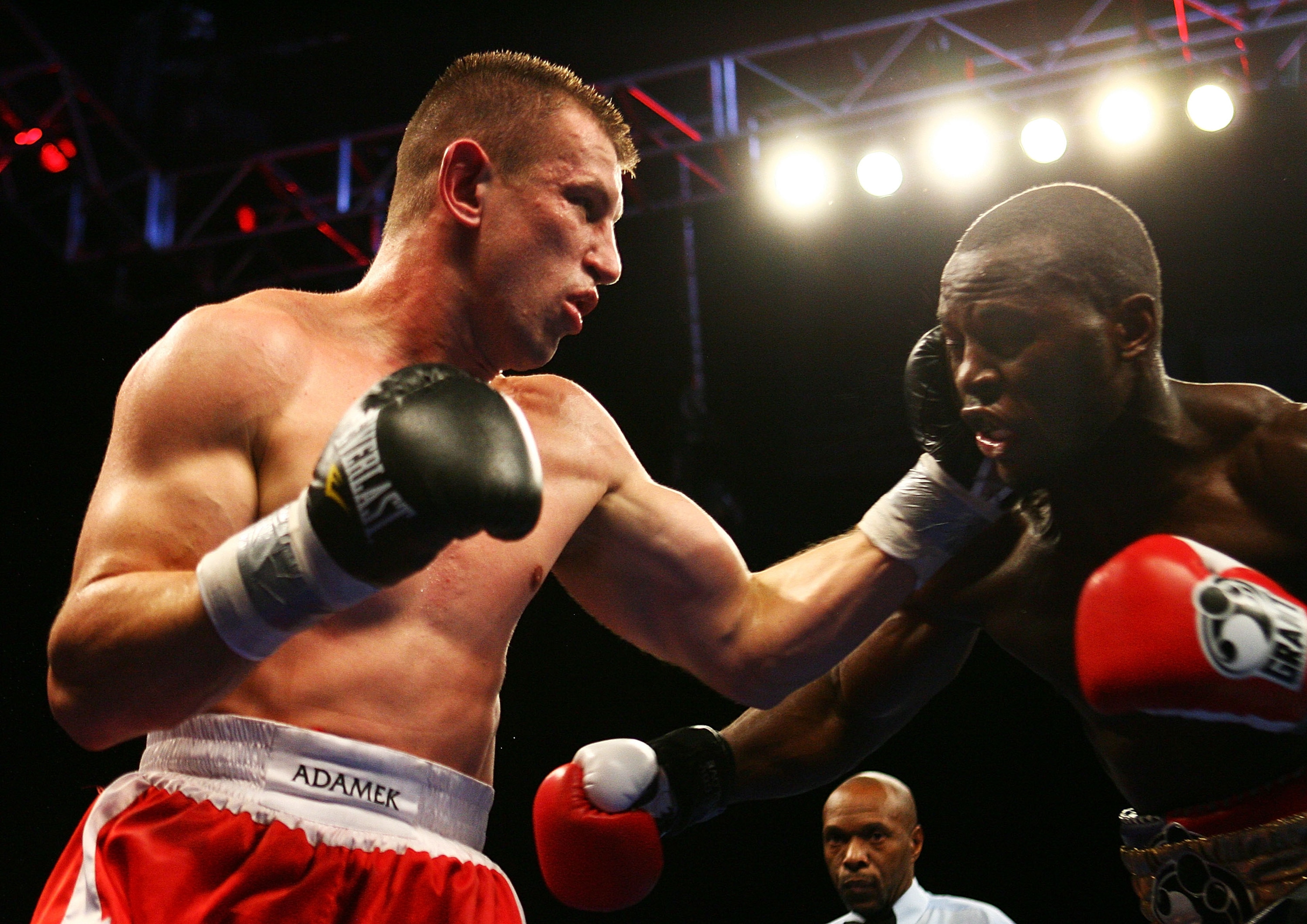 NEWARK, NJ - DECEMBER 11: Tomasz Adamek punches Steve Cunningham during their IBF Cruiserweight Championship fight on December 11, 2008 at The Prudential Center in Newark, New Jersey. Tomask won a split decision. (Photo by Al Bello/Getty Images) NEWARK, NJ - DECEMBER 11: Tomasz Adamek punches Steve Cunningham during their IBF Cruiserweight Championship fight on December 11, 2008 at The Prudential Center in Newark, New Jersey. Tomask won a split decision. (Photo by Al Bello/Getty Images)