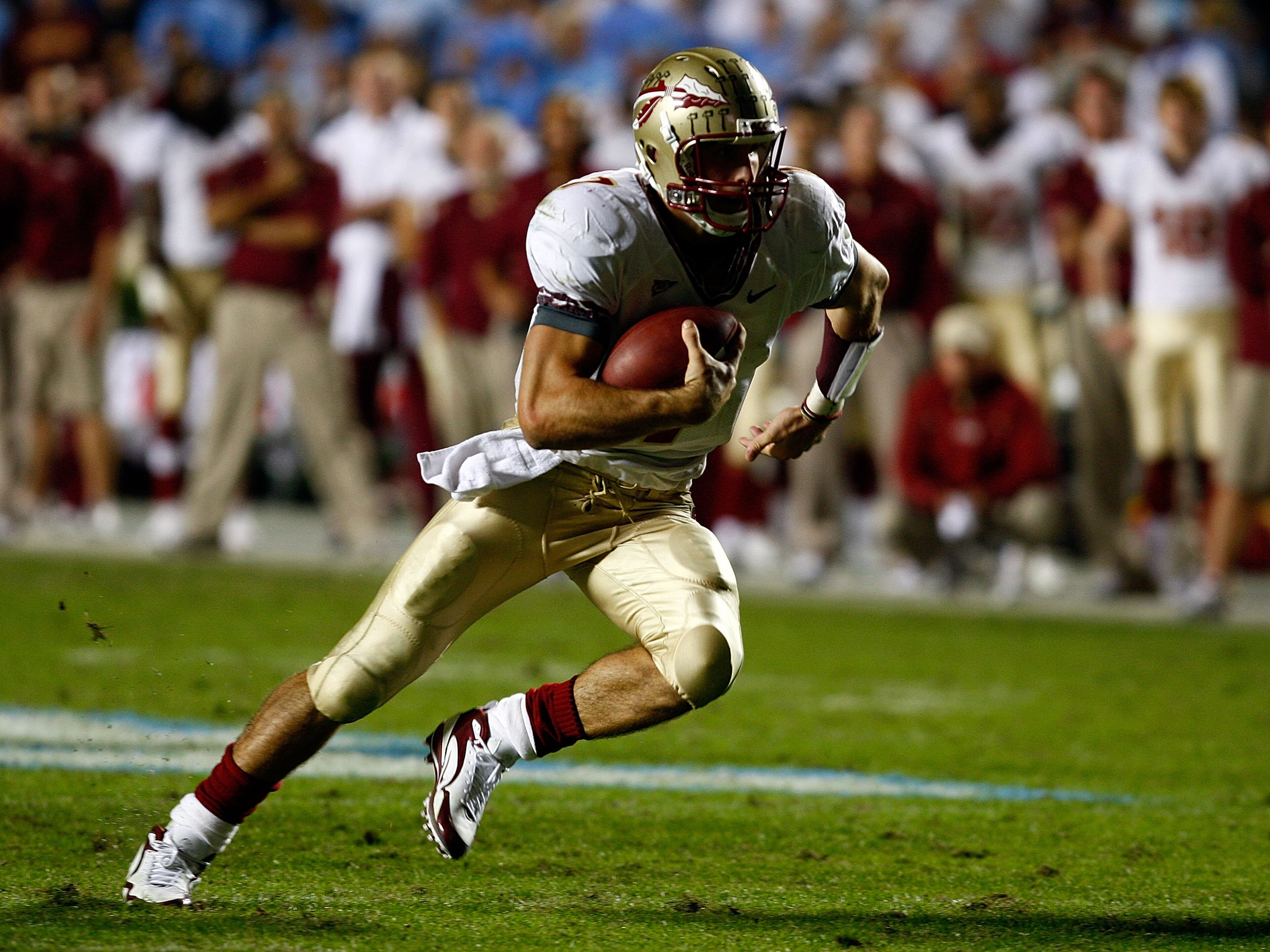 CHAPEL HILL, NC - OCTOBER 22:  Christian Ponder #7 of the Florida State Seminoles runs upfield against the North Carolina Tar Heels at Kenan Stadium on October 22, 2009 in Chapel Hill, North Carolina.  (Photo by Scott Halleran/Getty Images)