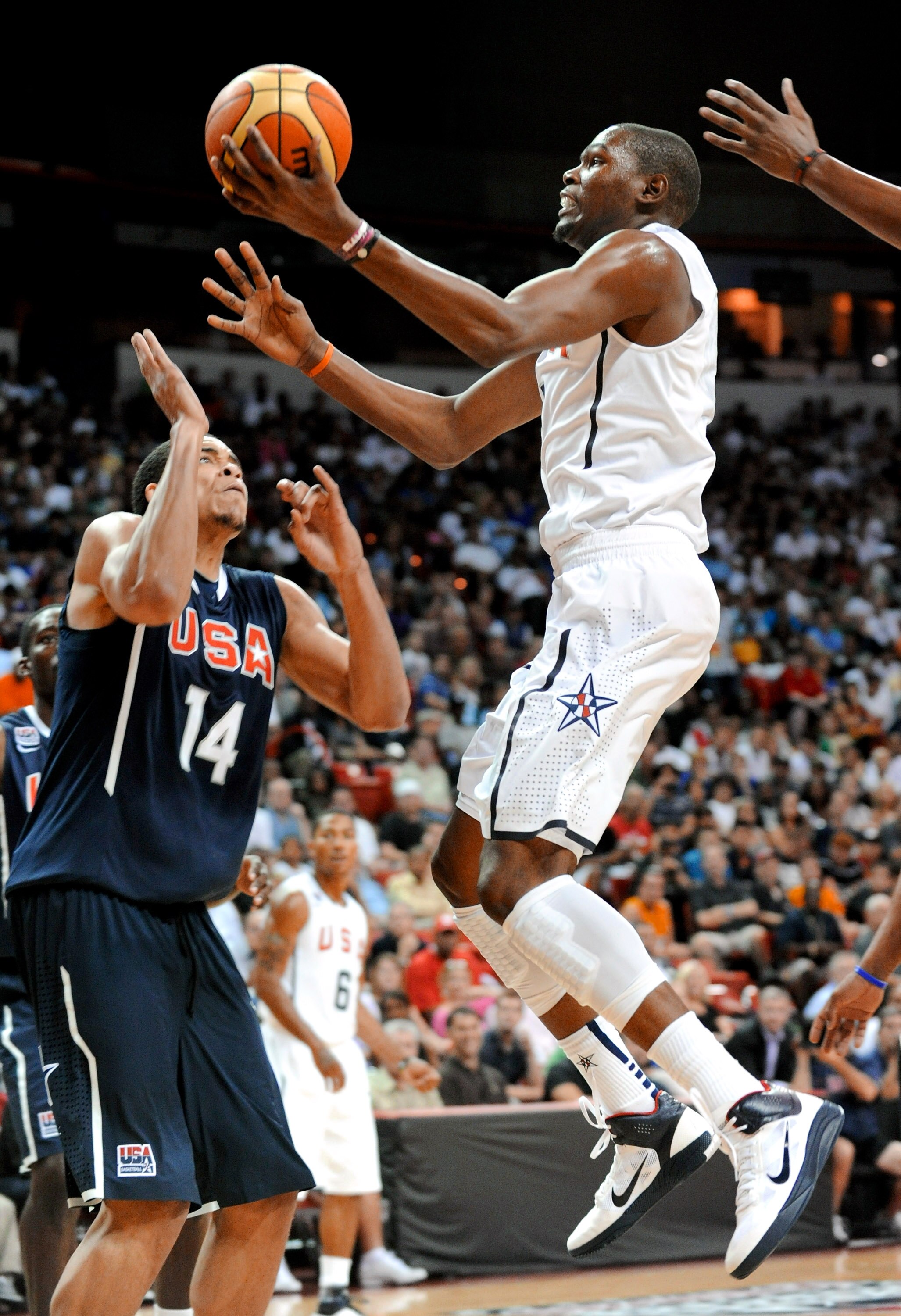 LAS VEGAS - JULY 24:  Kevin Durant #5 of the 2010 USA Basketball Men's National Team drives against JaVale McGee #14 of the 2010 USA Basketball Men's National Team during a USA Basketball showcase at the Thomas & Mack Center on July 24, 2010 in Las Vegas,