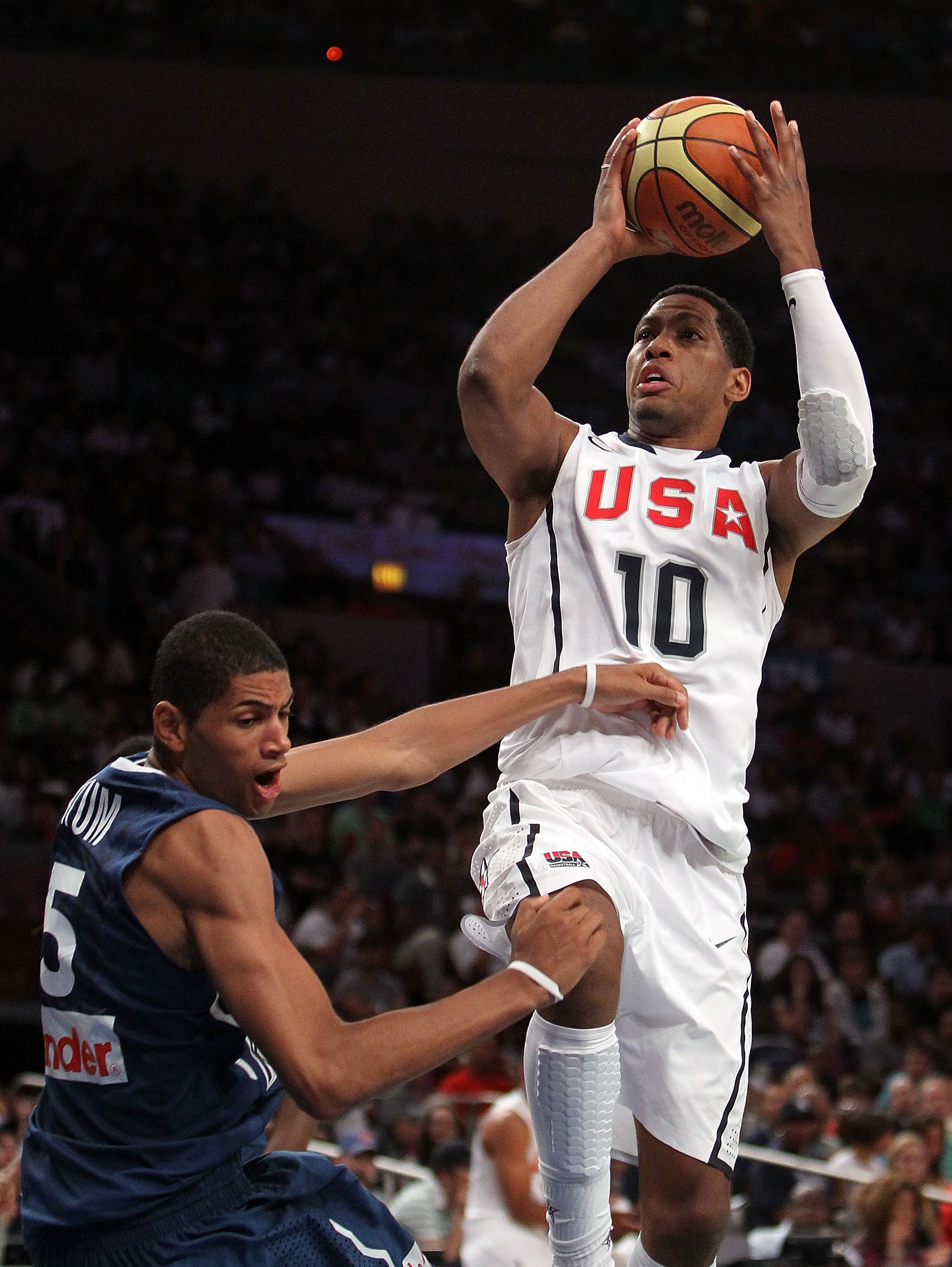 NEW YORK - AUGUST 15: Danny Granger #10 of the United States shoots over Nicholas Batum #5 of France during their exhibition game as part of the World Basketball Festival at Madison Square Garden on August 15, 2010 in New York City.  (Photo by Nick Laham/