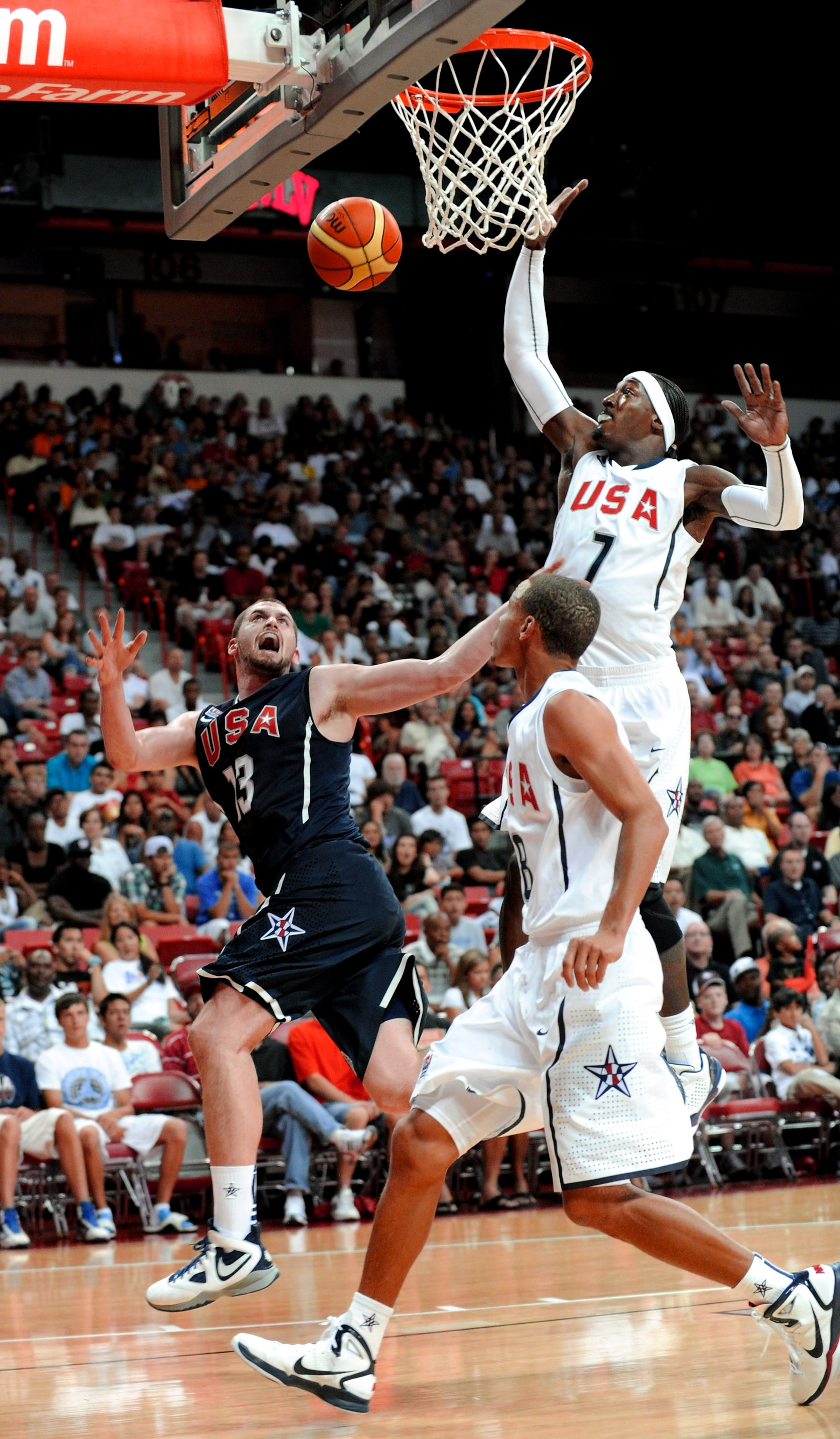 LAS VEGAS - JULY 24: Kevin Love #13 of the 2010 USA Basketball Men's National Team reacts after being fouled by Stephen Curry #8 of the 2010 USA Basketball Men's National Team as teammate Gerald Wallace #7 trails the play during a USA Basketball showcase LAS VEGAS - JULY 24: Kevin Love #13 of the 2010 USA Basketball Men's National Team reacts after being fouled by Stephen Curry #8 of the 2010 USA Basketball Men's National Team as teammate Gerald Wallace #7 trails the play during a USA Basketball showcase