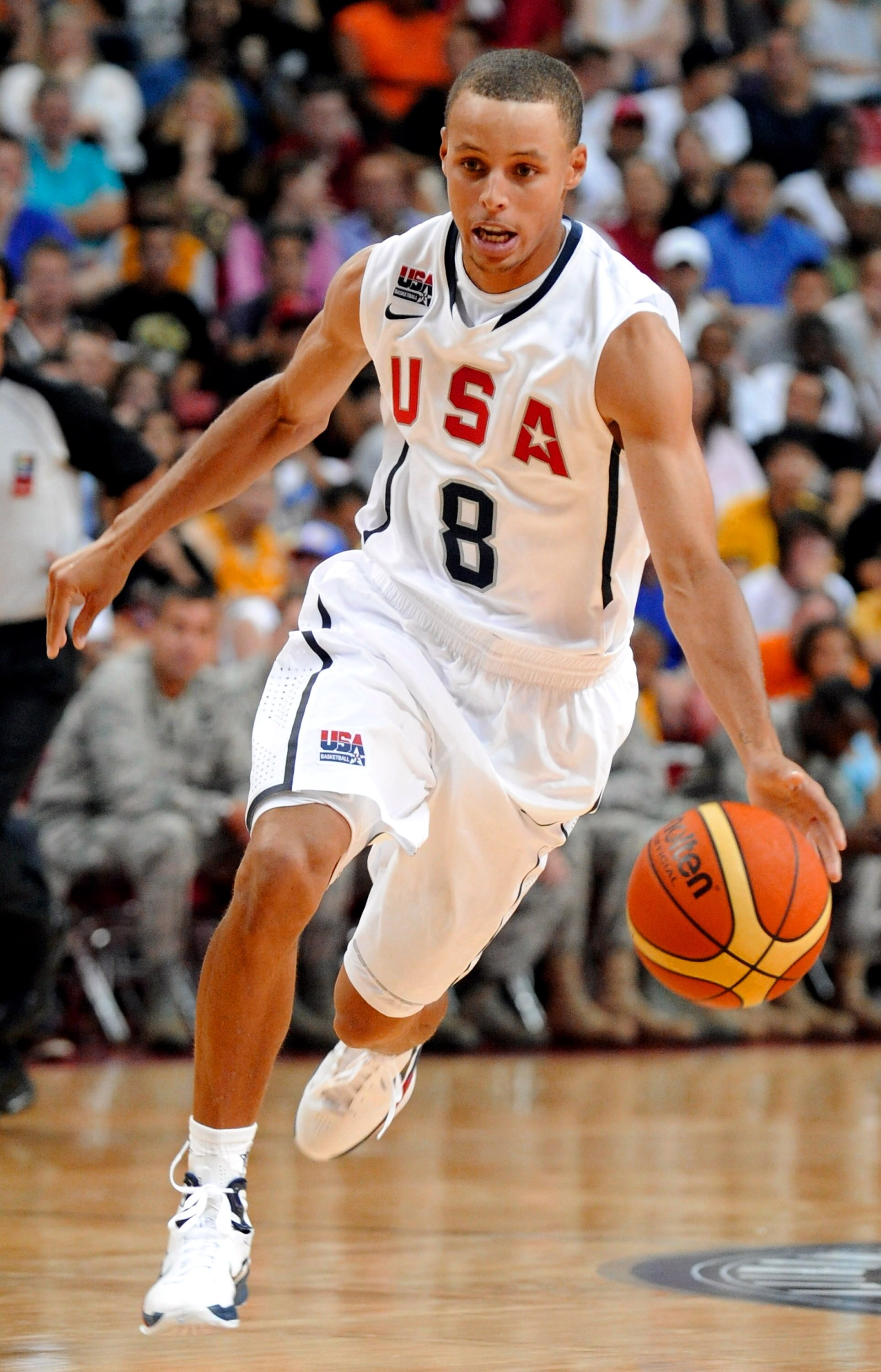 LAS VEGAS - JULY 24:  Stephen Curry #8 of the 2010 USA Basketball Men's National Team brings the ball up the court during a USA Basketball showcase at the Thomas & Mack Center on July 24, 2010 in Las Vegas, Nevada.  (Photo by Ethan Miller/Getty Images)