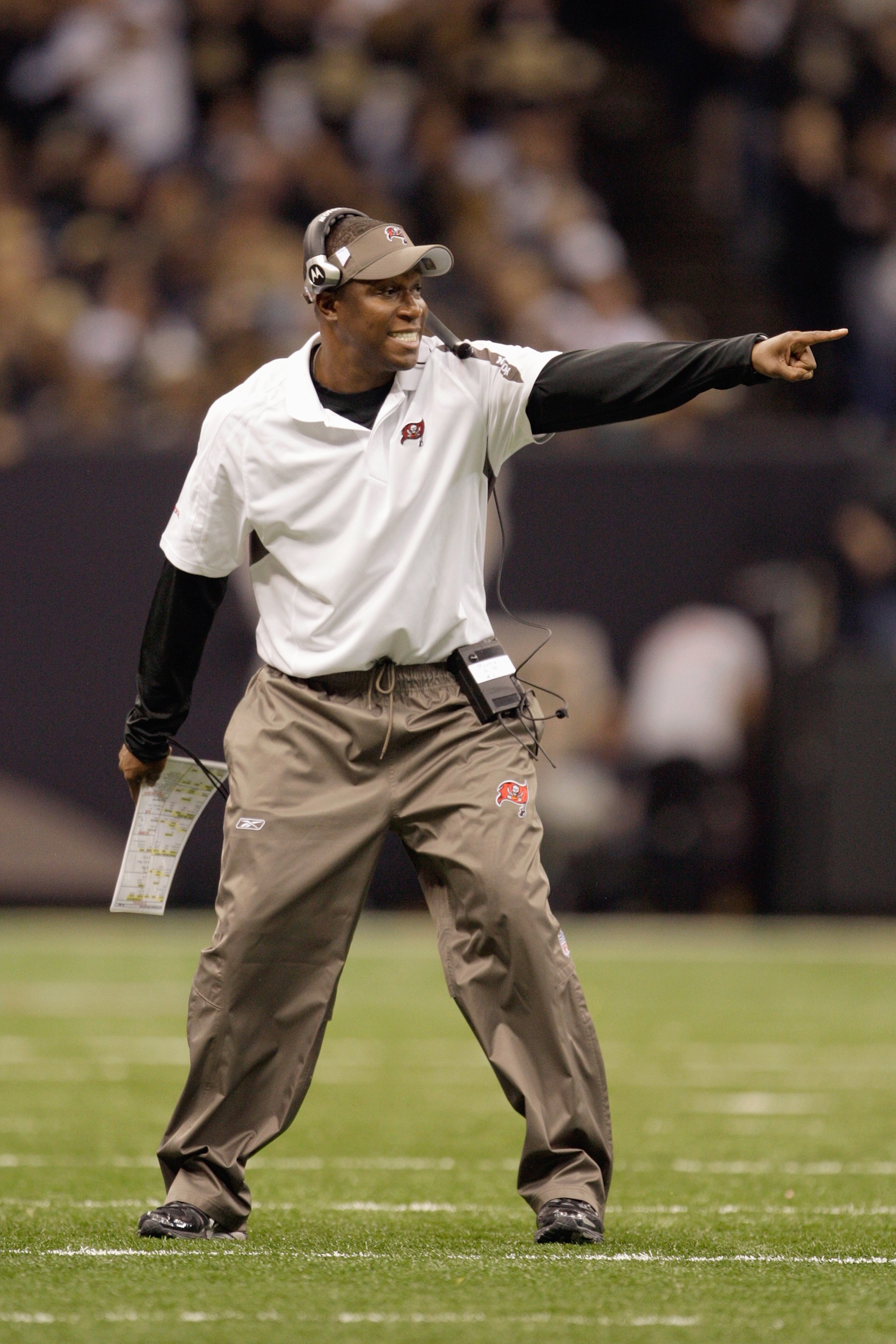 NEW ORLEANS - DECEMBER 27:  Head coach Raheem Morris of the Tampa Bay Buccaneers motions on the sidelines during the game against the New Orleans Saints at the Louisiana Superdome on December 27, 2009 in New Orleans, Louisiana. (Photo by Jamie Squire/Gett