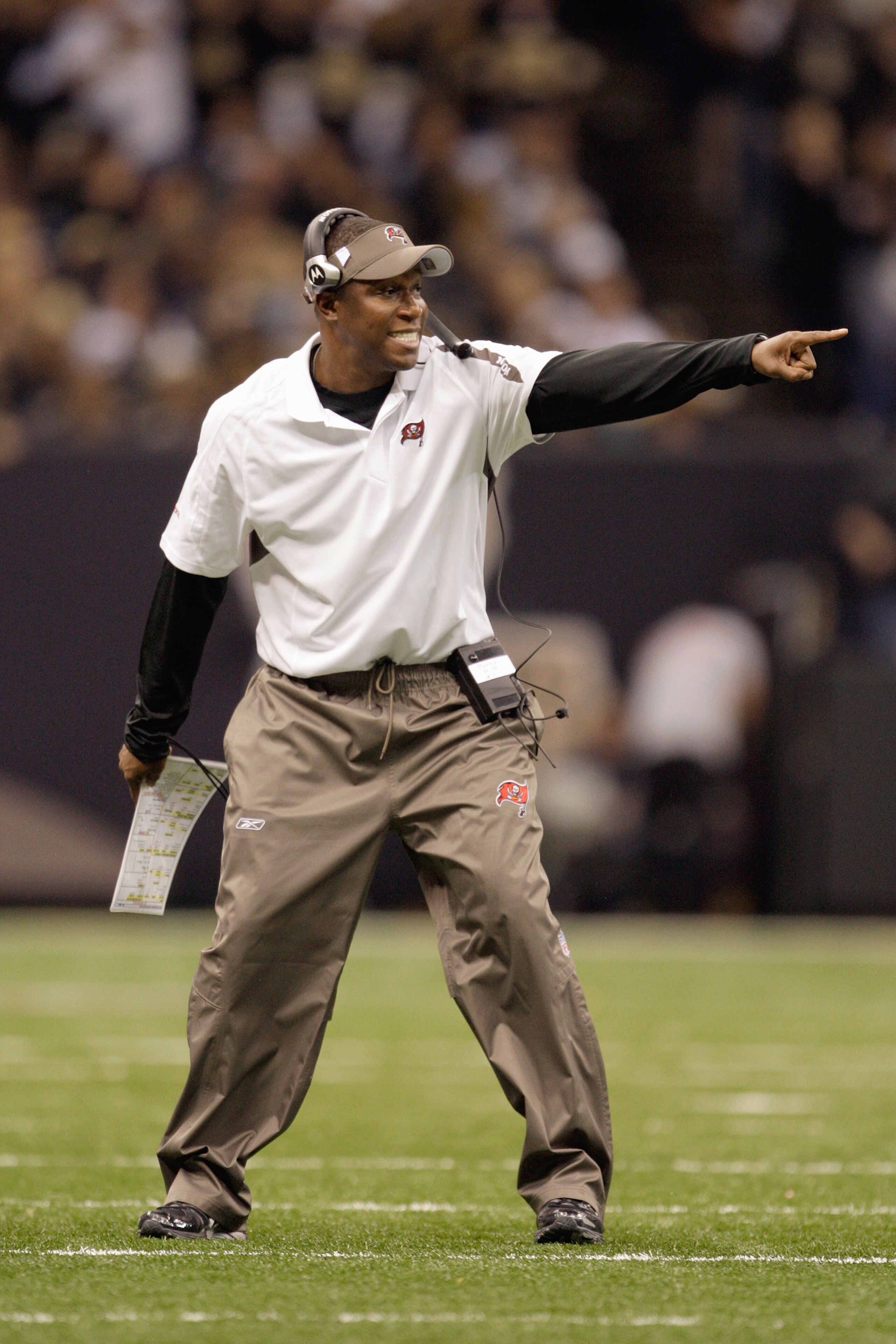 NEW ORLEANS - DECEMBER 27:  Head coach Raheem Morris of the Tampa Bay Buccaneers motions on the sidelines during the game against the New Orleans Saints at the Louisiana Superdome on December 27, 2009 in New Orleans, Louisiana. (Photo by Jamie Squire/Gett