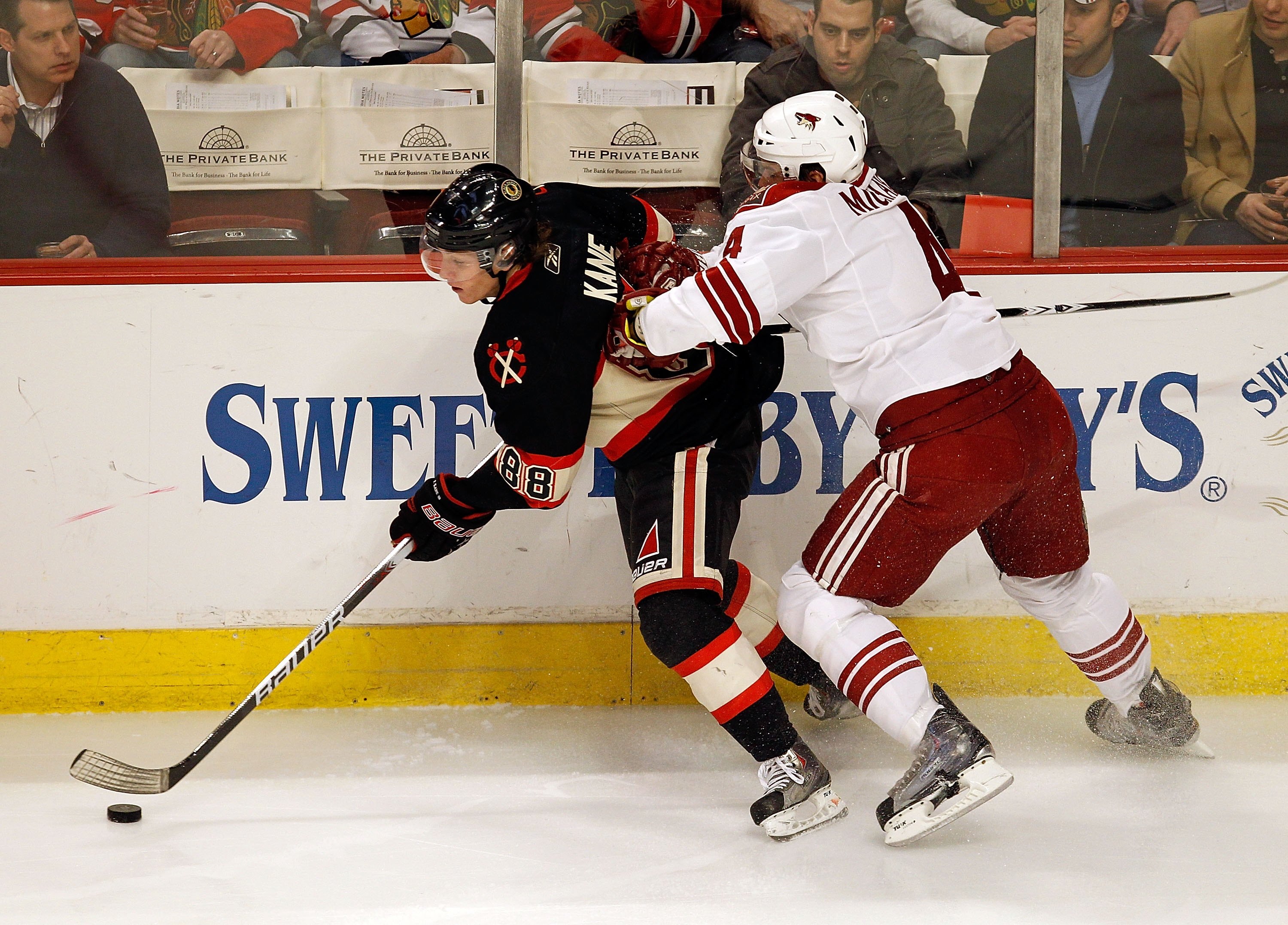 CHICAGO - MARCH 23: Patrick Kane #88 of the Chicago Blackhawks is pushed in the back by Zbynek Michalek #4 of the Phoenix Coyotes at the United Center on March 23, 2010 in Chicago, Illinois. The Blackhawks defeated the Coyotes 2-0. (Photo by Jonathan Dani CHICAGO - MARCH 23: Patrick Kane #88 of the Chicago Blackhawks is pushed in the back by Zbynek Michalek #4 of the Phoenix Coyotes at the United Center on March 23, 2010 in Chicago, Illinois. The Blackhawks defeated the Coyotes 2-0. (Photo by Jonathan Dani