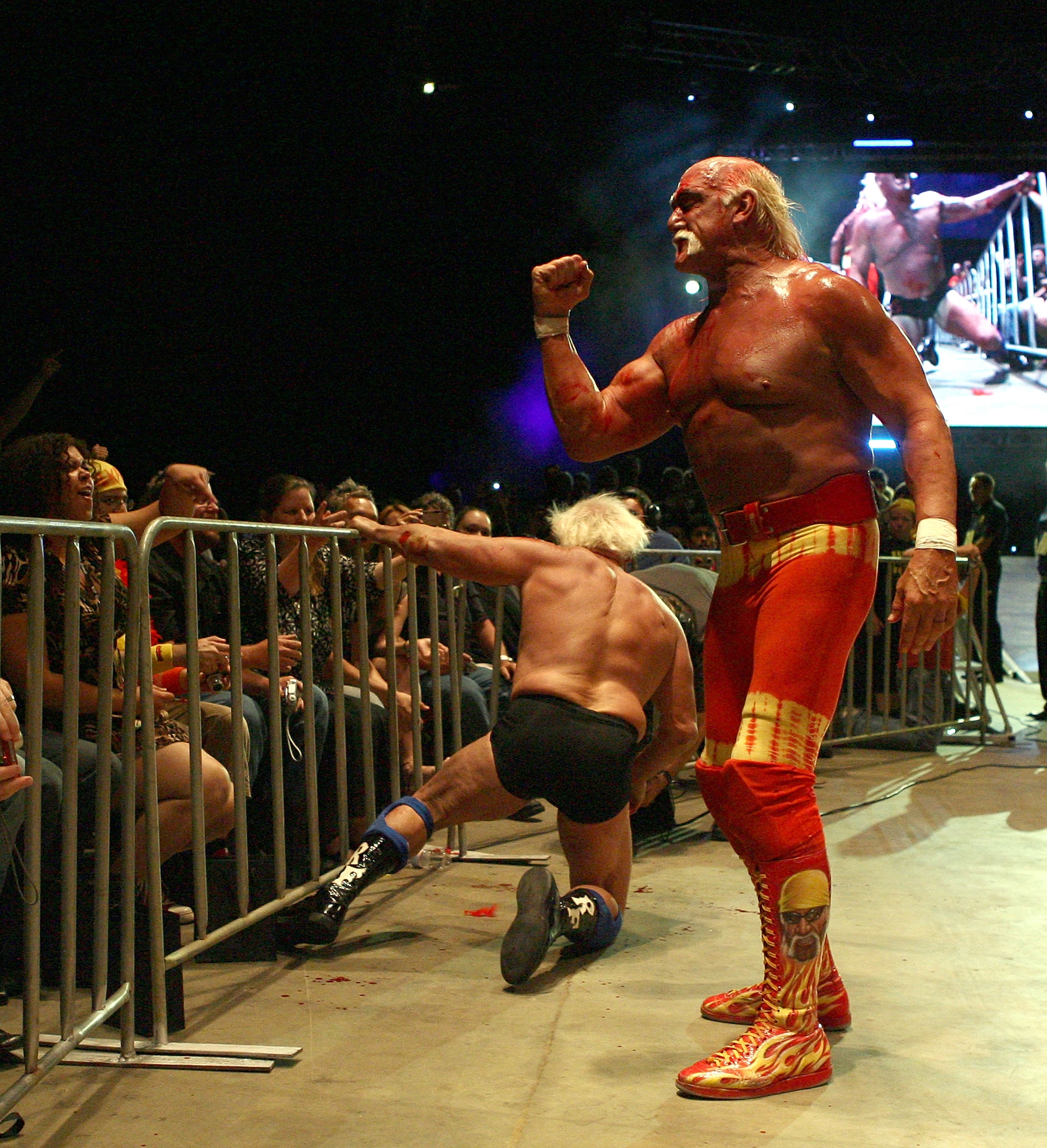 PERTH, AUSTRALIA - NOVEMBER 24:  Hulk Hogan gestures to the audience in the bout against Rick Flair during his Hulkamania Tour at the Burswood Dome on November 24, 2009 in Perth, Australia.  (Photo by Paul Kane/Getty Images)