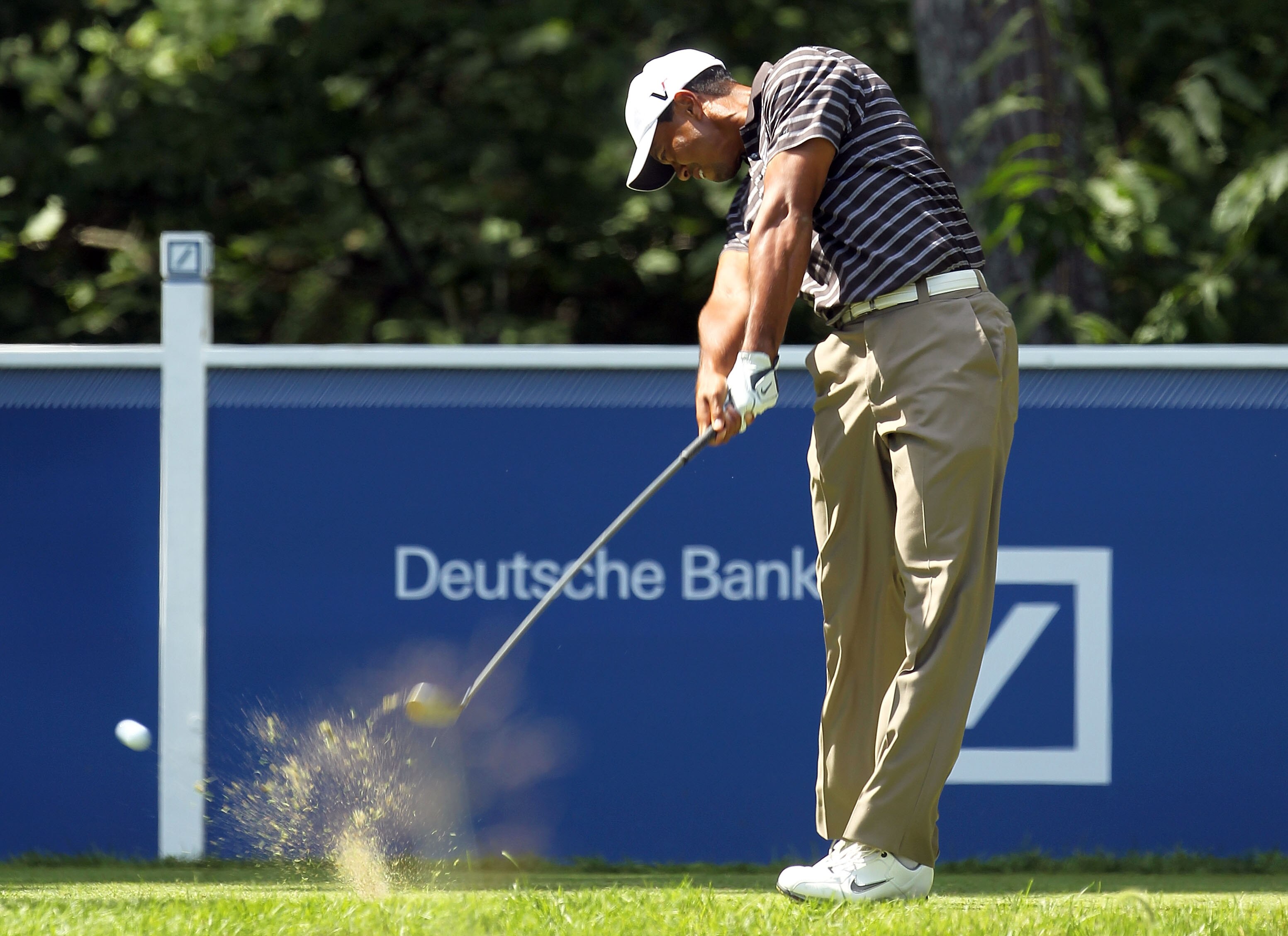 NORTON, MA - SEPTEMBER 05:  Tiger Woods tees off on the fourth hole during the third round of the Deutsche Bank Championship at TPC Boston on September 5, 2010 in Norton, Massachusetts.  (Photo by Mike Ehrmann/Getty Images)