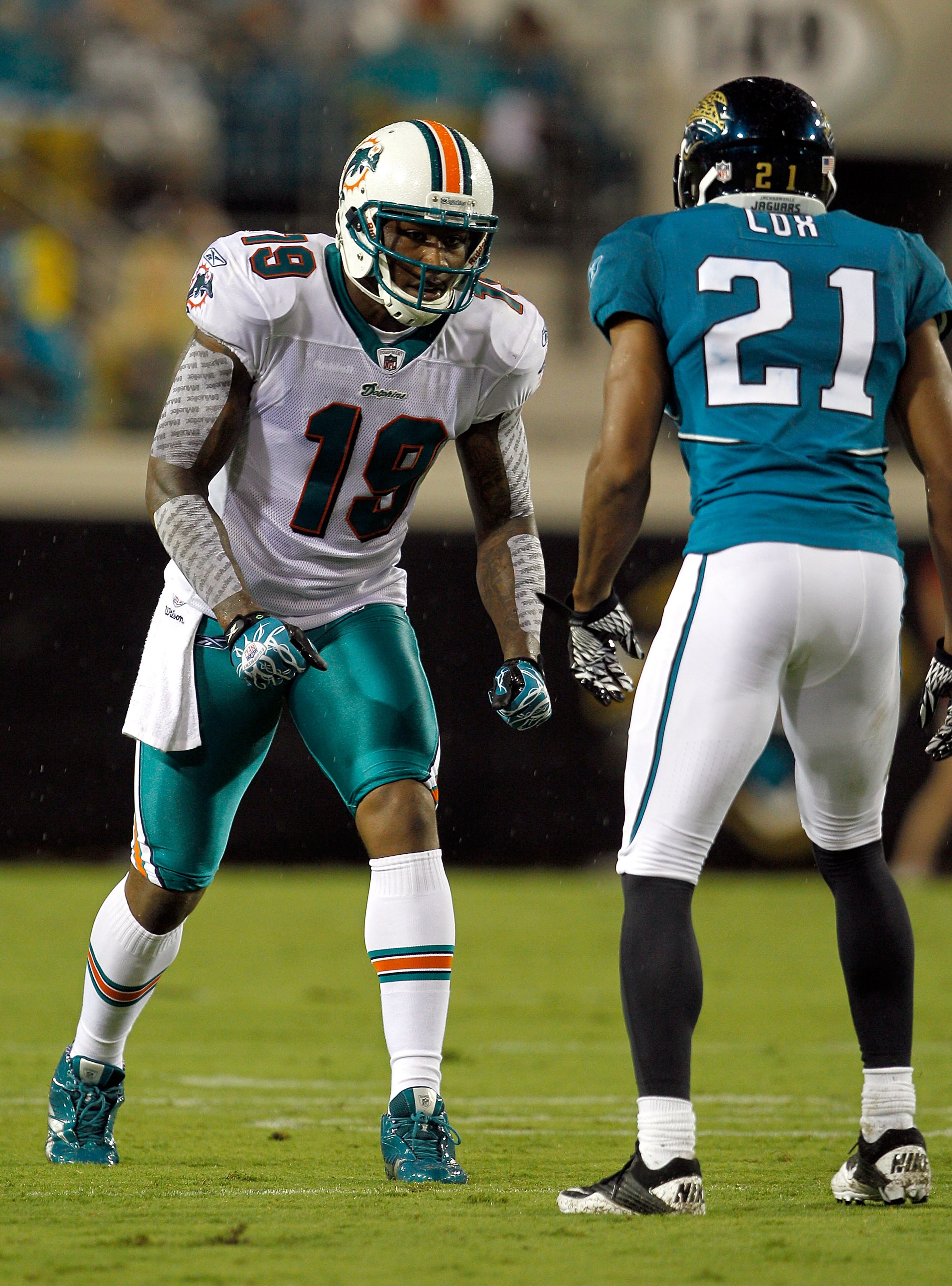 JACKSONVILLE, FL - AUGUST 21:  Brandon Marshall #19 of the Miami Dolphins lines up against Derek Cox #21 of the Jacksonville Jaguars during the preseason game at EverBank Field on August 21, 2010 in Jacksonville, Florida.  (Photo by Sam Greenwood/Getty Im
