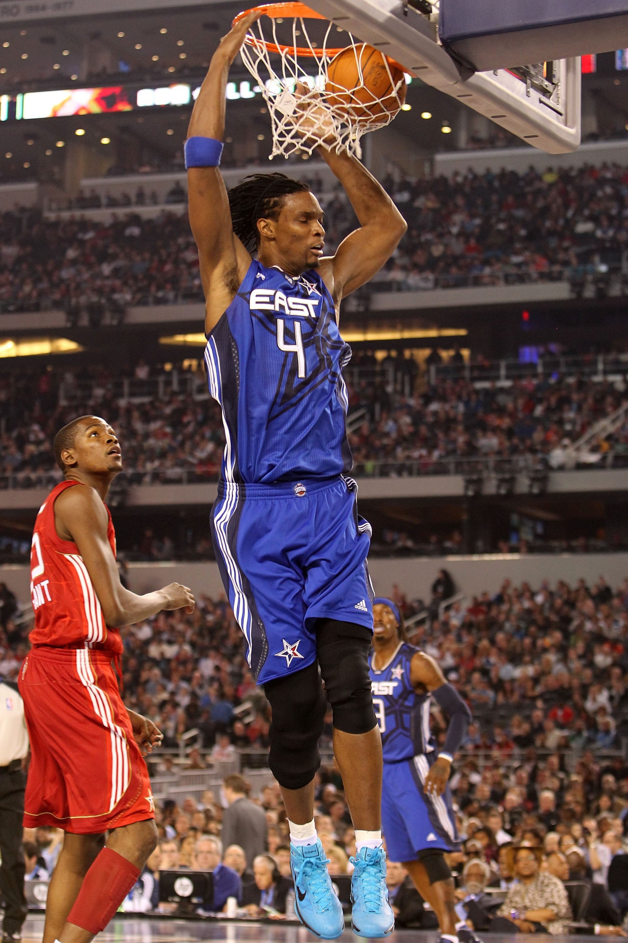 ARLINGTON, TX - FEBRUARY 14:  Chris Bosh #4 of the Eastern Conference shoots against Kevin Durant #35 of the Western Conference during the NBA All-Star Game, part of 2010 NBA All-Star Weekend at Cowboys Stadium on February 14, 2010 in Arlington, Texas. Th