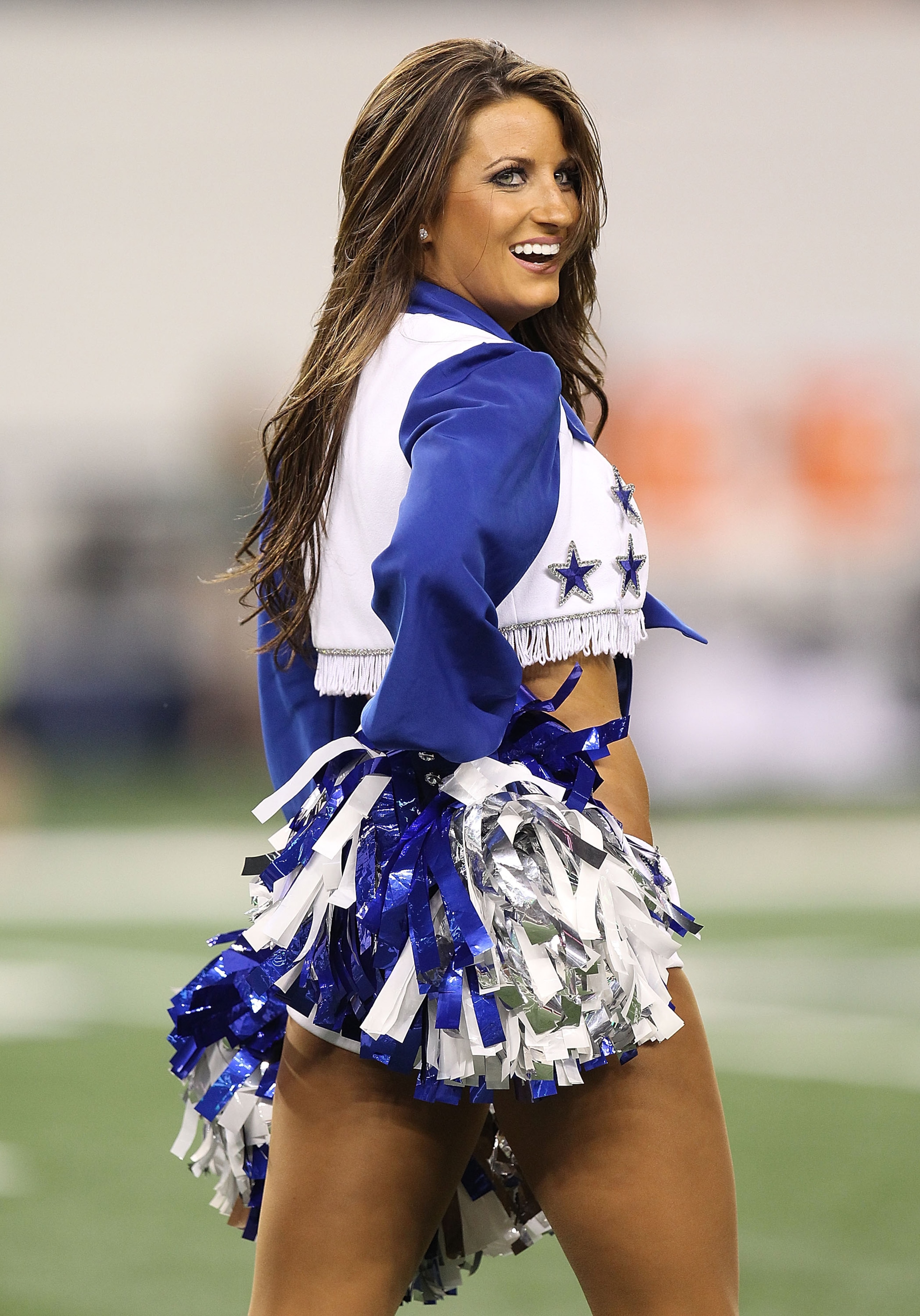 ARLINGTON, TX - SEPTEMBER 02:  A Dallas Cowboys cheerleader performs during a preseason game at Cowboys Stadium on September 2, 2010 in Arlington, Texas.  (Photo by Ronald Martinez/Getty Images)