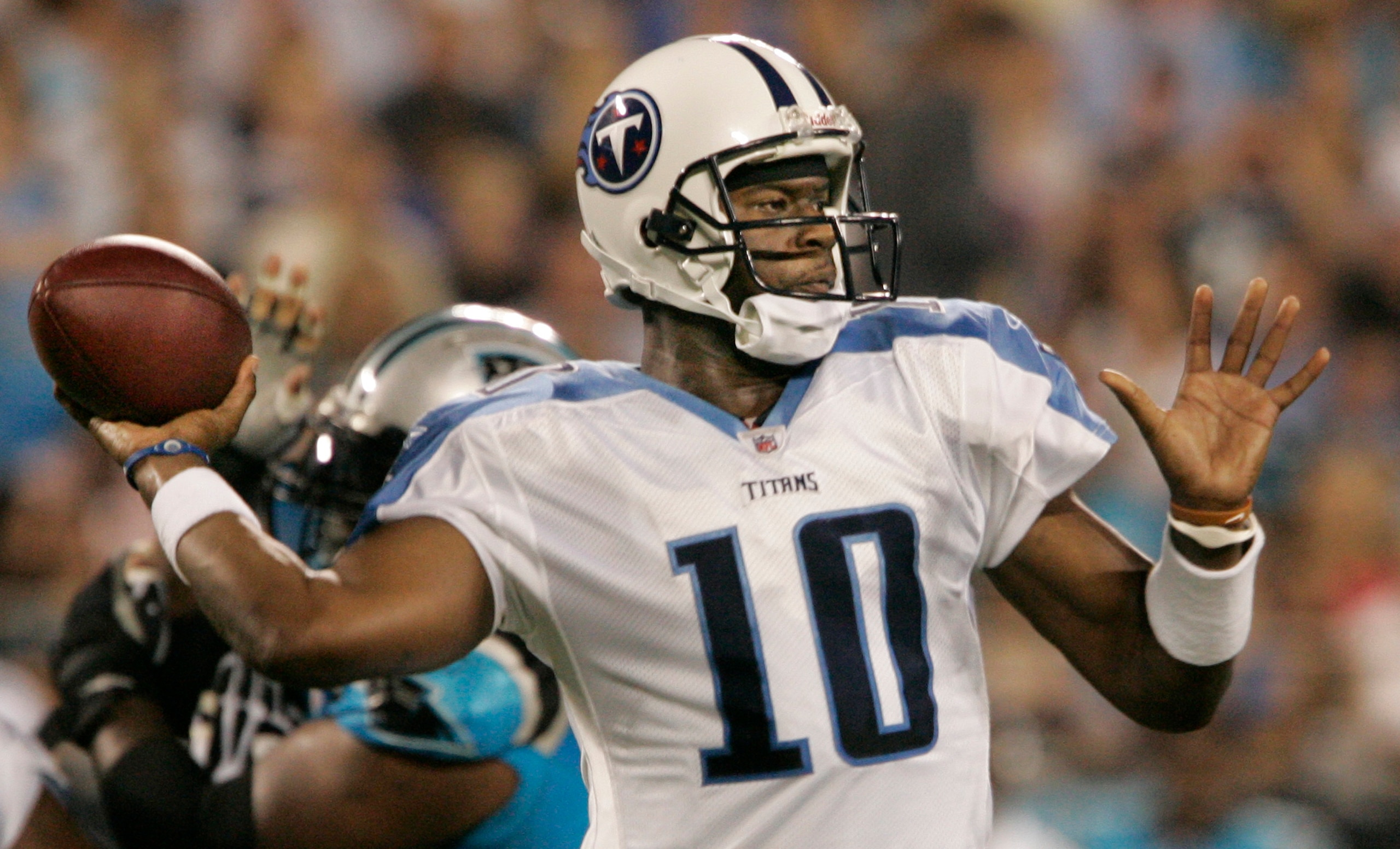 CHARLOTTE, NC - AUGUST 28:  Quarterback Vince Young #10 of the Tennessee Titans throws during their preseason game against the Carolina Panthers at Bank of America Stadium on August 28, 2010 in Charlotte, North Carolina. (Photo by Mary Ann Chastain/Getty 