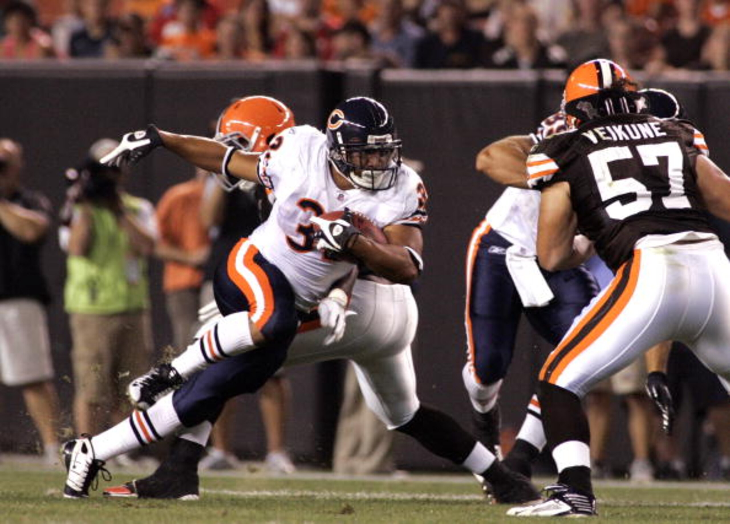 CLEVELAND - SEPTEMBER 2:  Kahlil Bell #32 of the Chicago Bears carries the ball up field against the Cleveland Browns during the preseason game on September 2, 2010 at Cleveland Browns Stadium in Cleveland, Ohio. The Browns defeated the Bears 13-10.  (Pho