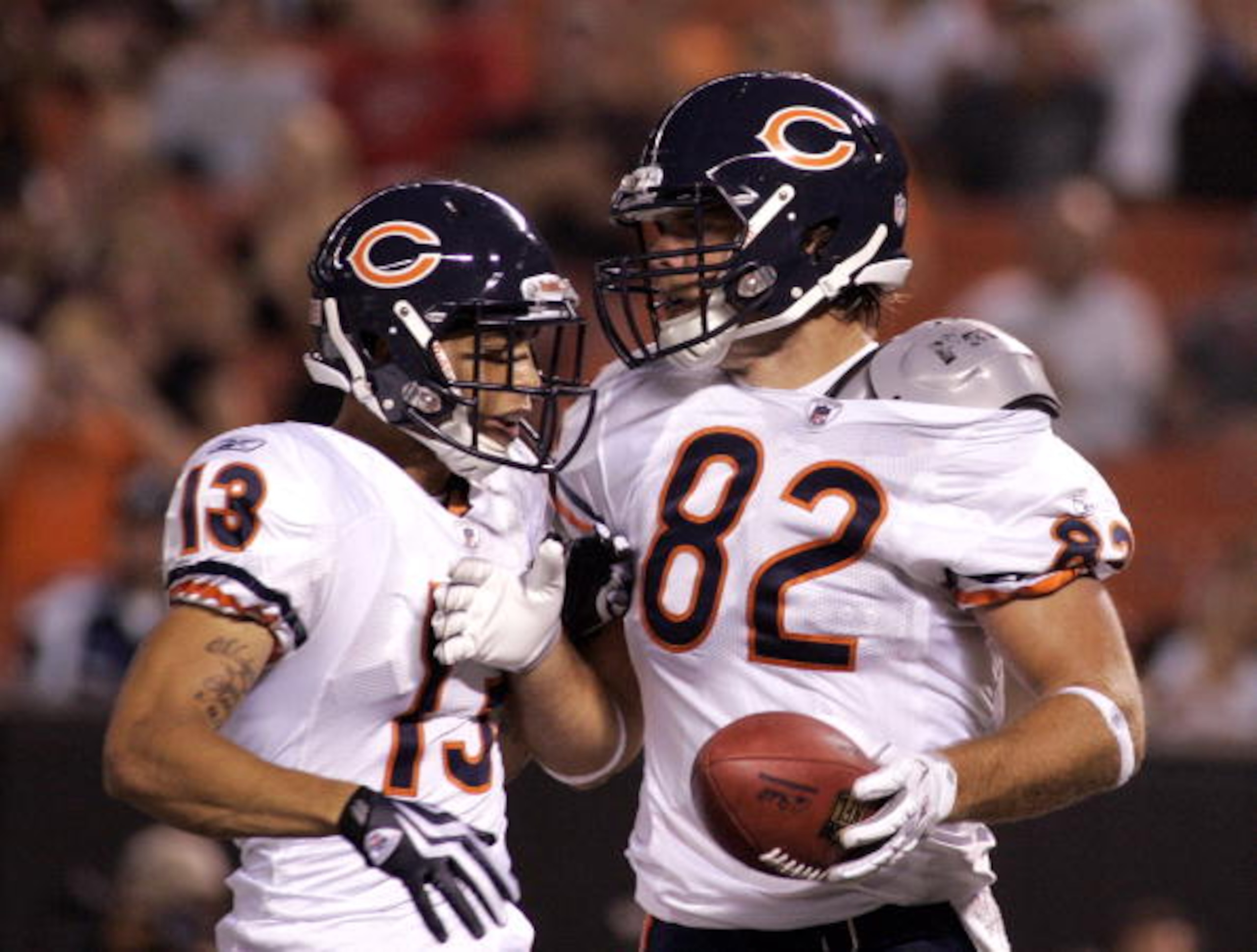 CLEVELAND - SEPTEMBER 2:  Greg Olsen #82 of the Chicago Bears celebrates his first half touchdown with Johnny Knox #13 against the Cleveland Browns during the preseason game on September 2, 2010 at Cleveland Browns Stadium in Cleveland, Ohio. (Photo by Ju