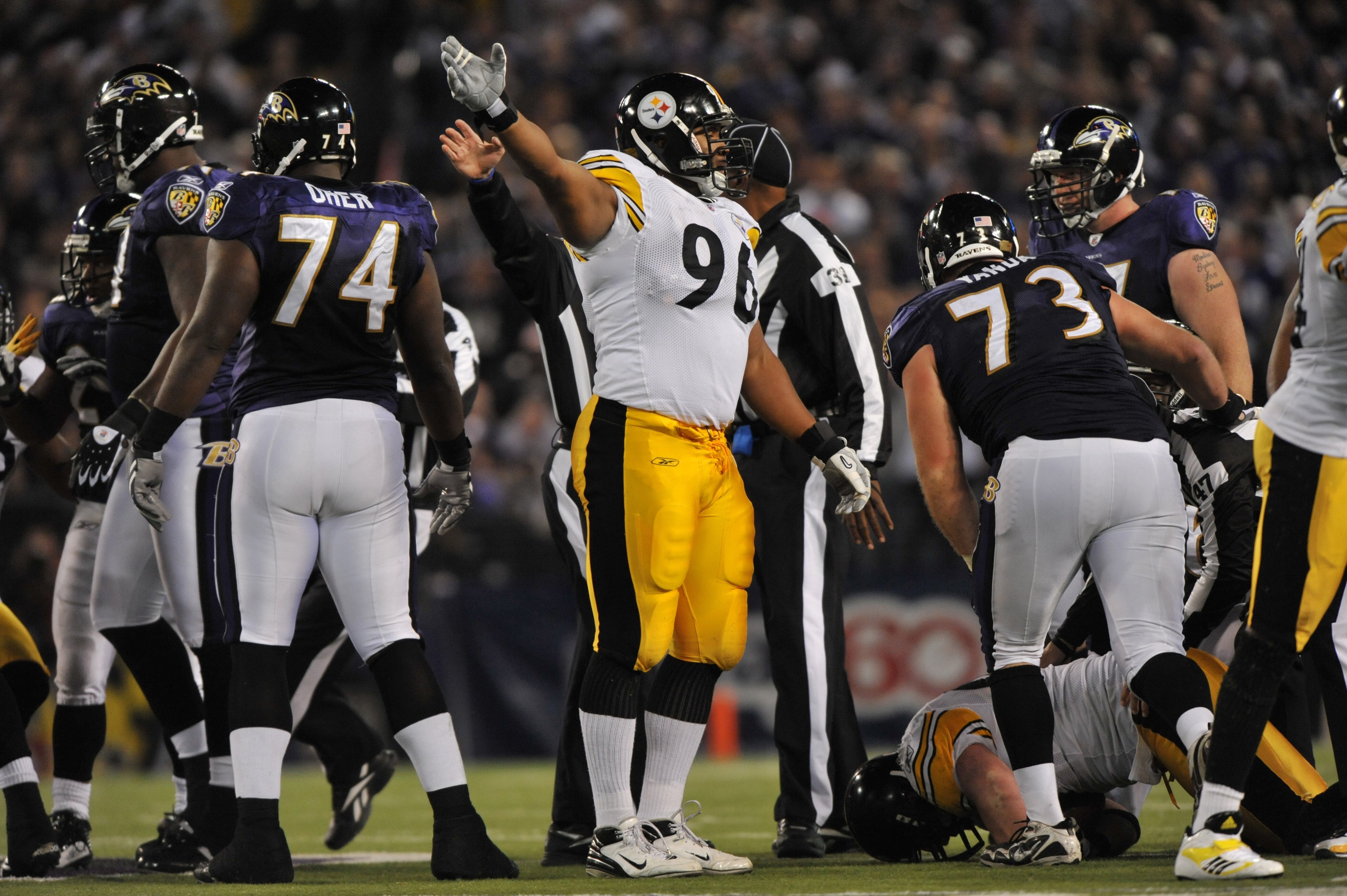 BALTIMORE - NOVEMBER 29:  Ziggy Hood #96 of the Pittsburgh Steelers signals possesion of a Ravens fumble during the game against the  Baltimore Ravens at M&T Bank Stadium on November 29, 2009 in Baltimore, Maryland. The Ravens defeated the Steelers 20-17.