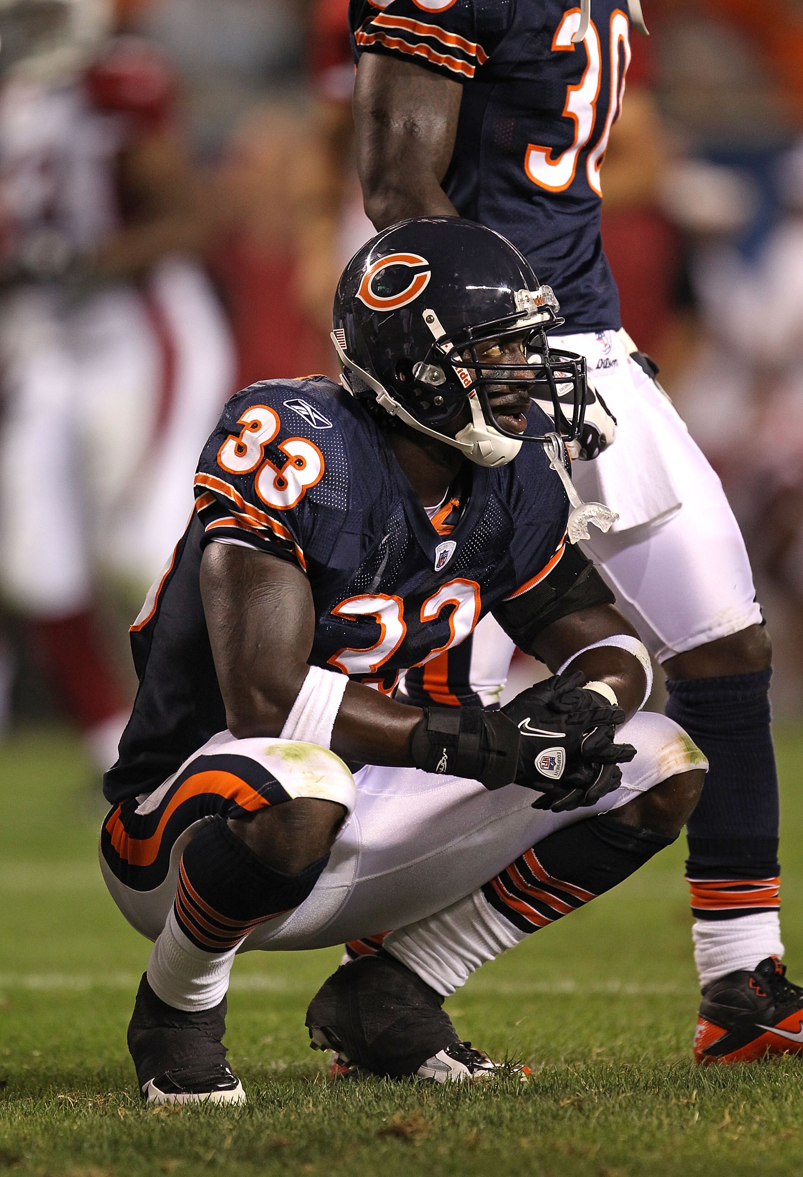 CHICAGO - AUGUST 28: Charles Tillman #33 of the Chicago Bears reacts after giving up a touchdown to  the Arizona Cardinals during a preseason game at Soldier Field on August 28, 2010 in Chicago, Illinois. The Cardinals defeated the Bears 14-9. (Photo by J