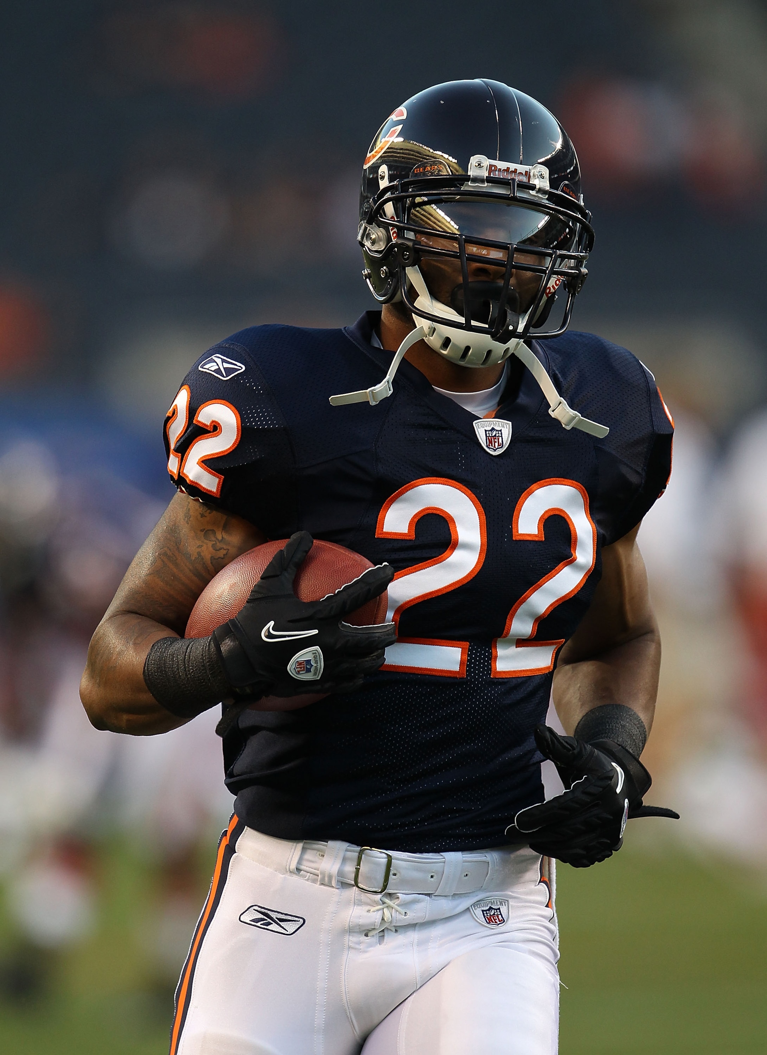 CHICAGO - AUGUST 28: Matt Forte #22 of the Chicago Bears participates in warm-ups before a preseason game against the Arizona Cardinals at Soldier Field on August 28, 2010 in Chicago, Illinois. The Cardinals defeated the Bears 14-9. (Photo by Jonathan Dan