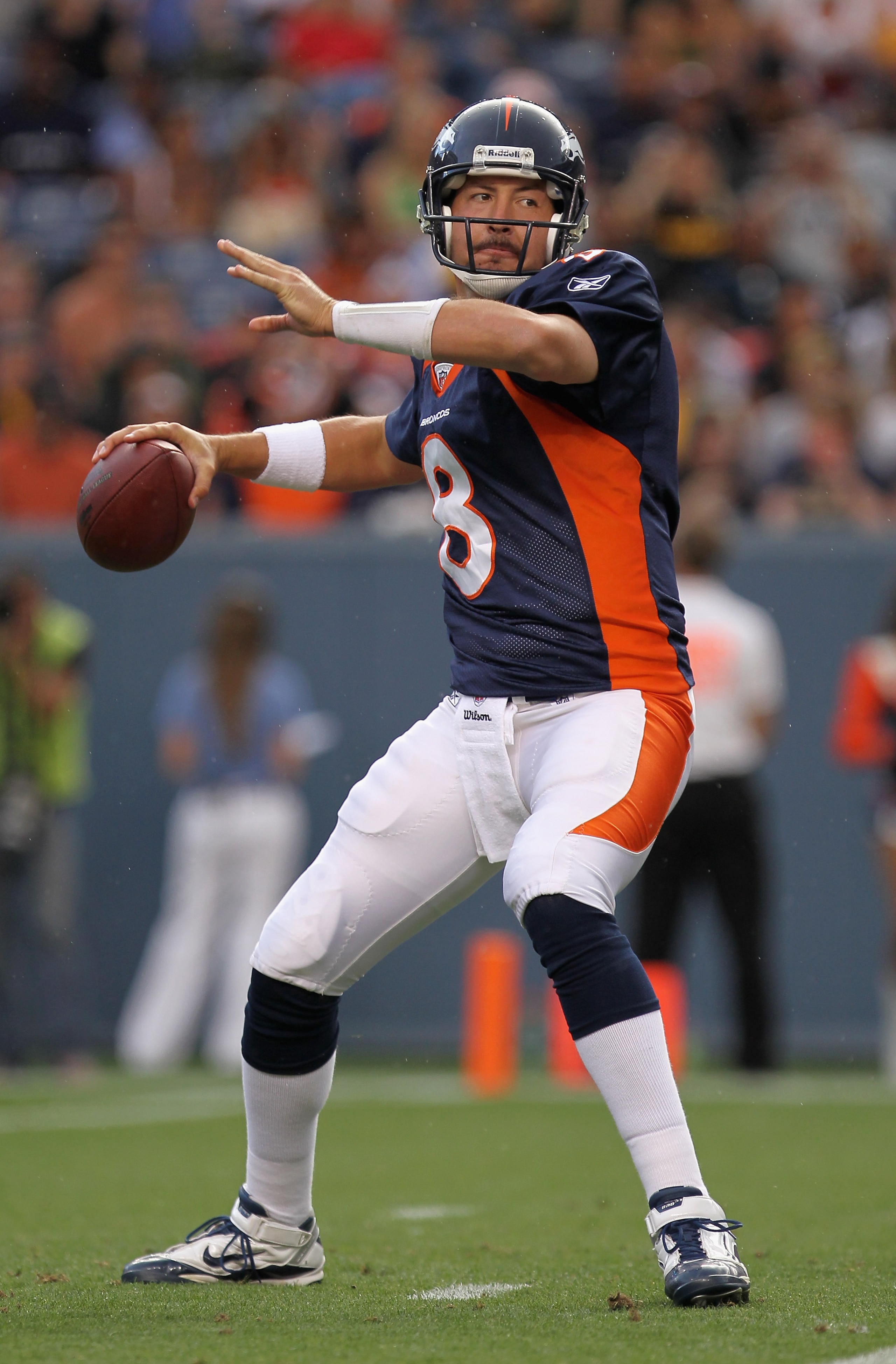 DENVER - AUGUST 29:  Quarterback Kyle Orton #8 of the Denver Broncos drops back to deliver a pass against the Pittsburgh Steelers during preseason NFL action at INVESCO Field at Mile High on August 29, 2010 in Denver, Colorado. The Broncos defeated the St