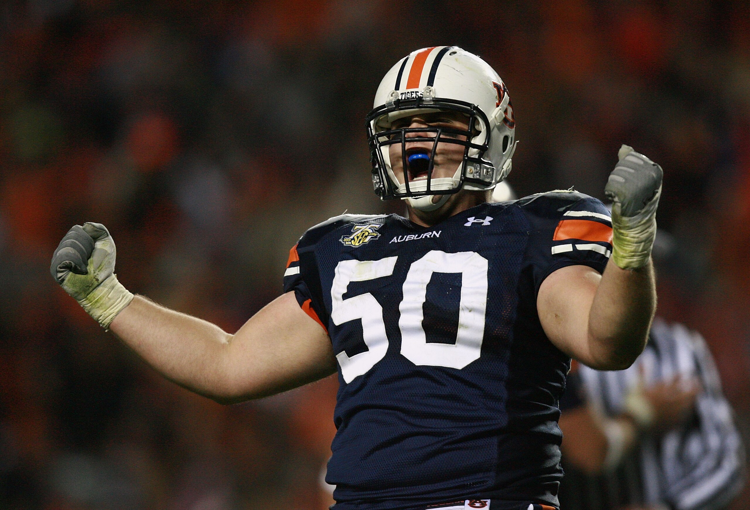 AUBURN, AL - NOVEMBER 24: Offensive lineman Ryan Pugh #50 of the Auburn Tigers celebrates after picking up a first down with less than a minute to play in the game against the Alabama Crimson Tide at Jordan-Hare Stadium on November 24, 2007 in Auburn, Al AUBURN, AL - NOVEMBER 24: Offensive lineman Ryan Pugh #50 of the Auburn Tigers celebrates after picking up a first down with less than a minute to play in the game against the Alabama Crimson Tide at Jordan-Hare Stadium on November 24, 2007 in Auburn, Al