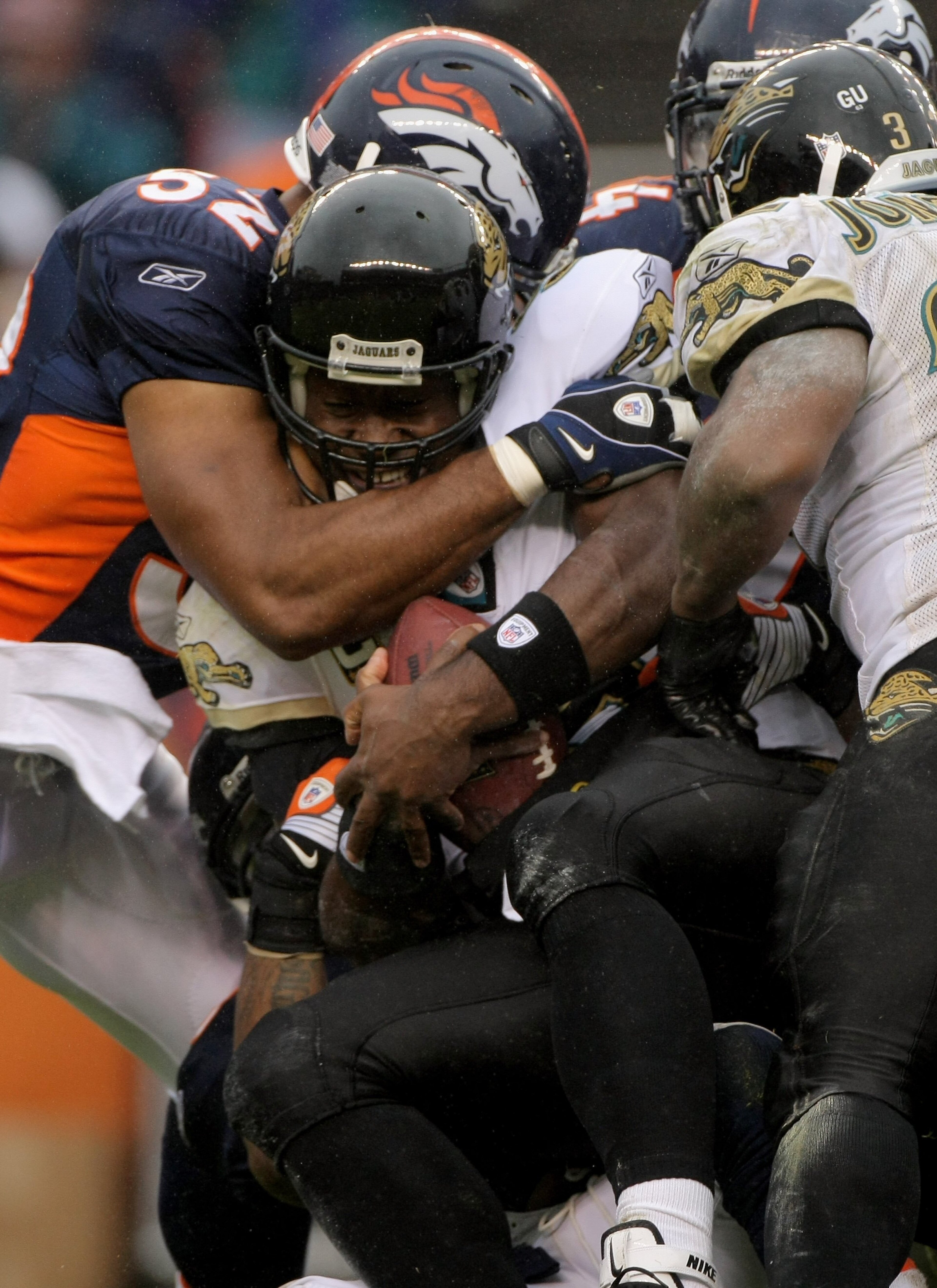 DENVER - OCTOBER 12:  Quarterback David Garrard #9 of the Jacksonville Jaguars is sacked by linebacker Nate Webster #58 of the Denver Broncos during NFL action at Invesco Field at Mile High on October 12, 2008 in Denver, Colorado. The Jaguars defeated the