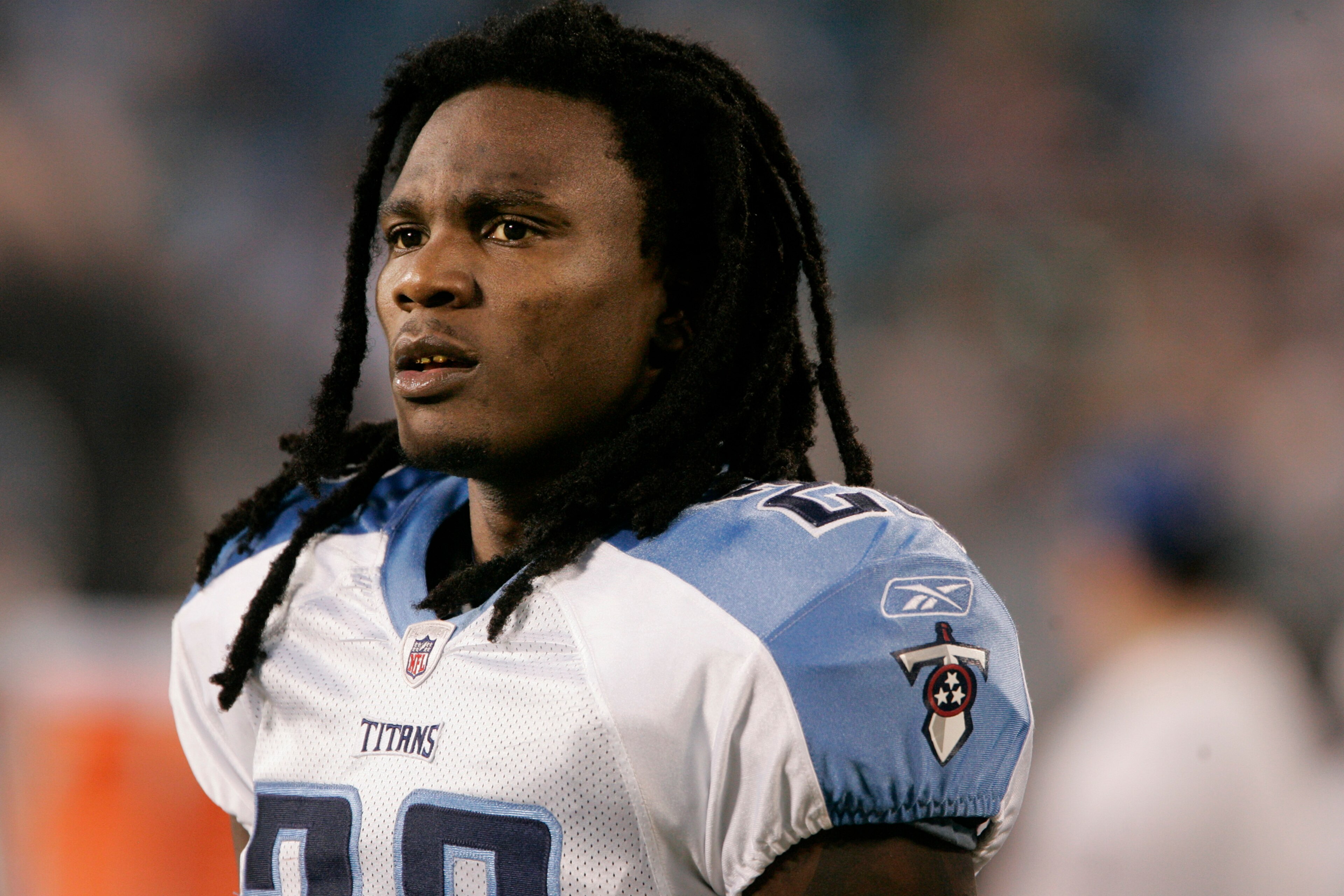 CHARLOTTE, NC - AUGUST 28: Runningback Chris Johnson #28 of the Tennessee Titans walks on the sidelines before the start of their preseason game against the Carolina Panthers at Bank of America Stadium on August 28, 2010 in Charlotte, North Carolina. (P CHARLOTTE, NC - AUGUST 28: Runningback Chris Johnson #28 of the Tennessee Titans walks on the sidelines before the start of their preseason game against the Carolina Panthers at Bank of America Stadium on August 28, 2010 in Charlotte, North Carolina. (P