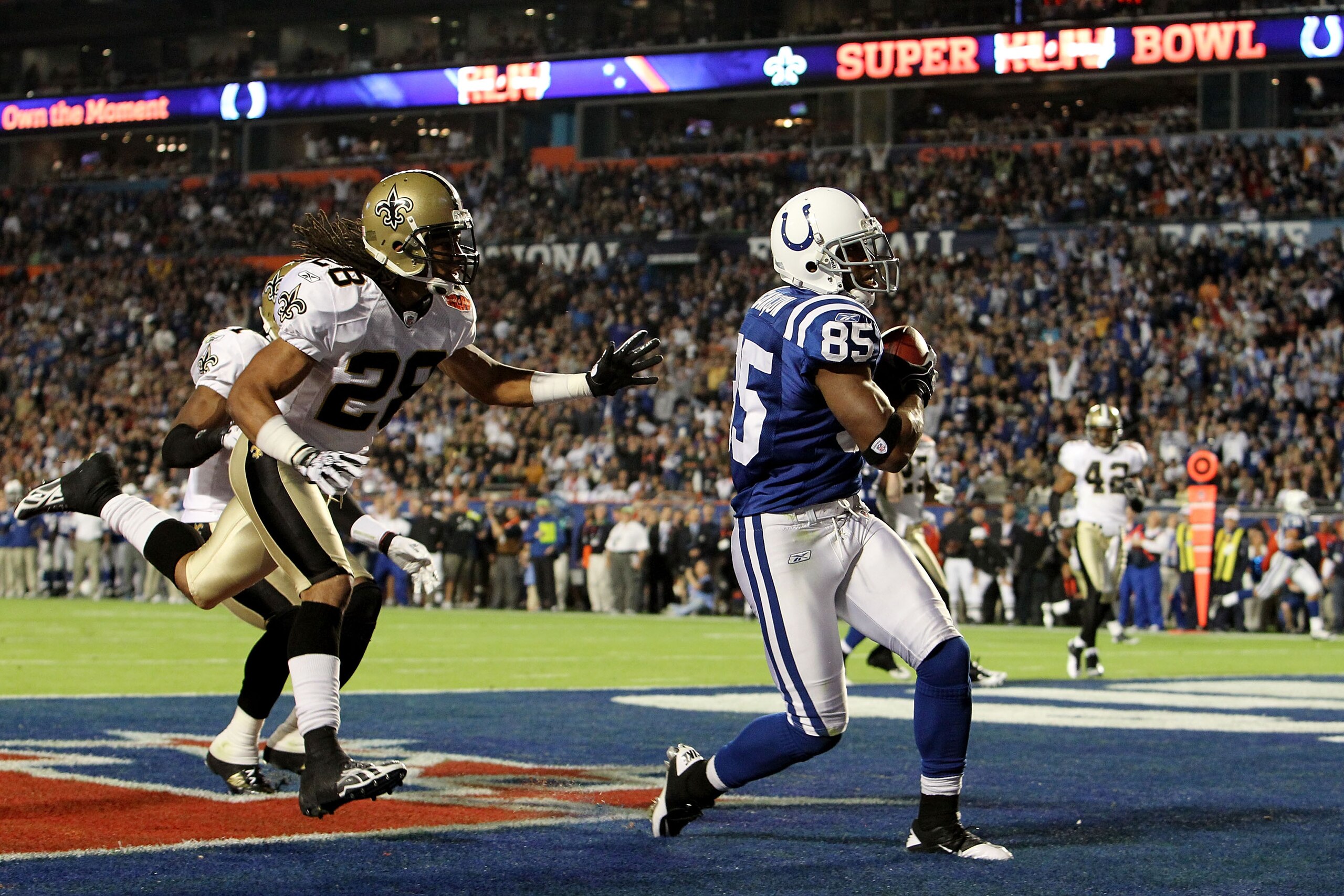 MIAMI GARDENS, FL - FEBRUARY 07:  Pierre Garcon #85 of the Indianapolis Colts catches a touchdown pass in the first quarter against the New Orleans Saints during Super Bowl XLIV on February 7, 2010 at Sun Life Stadium in Miami Gardens, Florida.  (Photo by