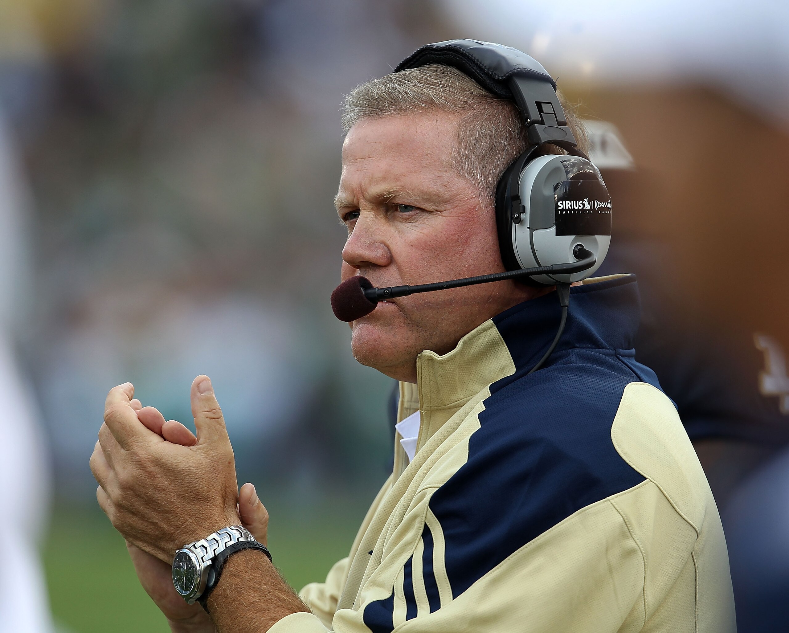 SOUTH BEND, IN - SEPTEMBER 04: Head coach Brian Kelly of the Notre Dame Fighting Irish encourages his team against the Purdue Boilermakers at Notre Dame Stadium on September 4, 2010 in South Bend, Indiana. (Photo by Jonathan Daniel/Getty Images)