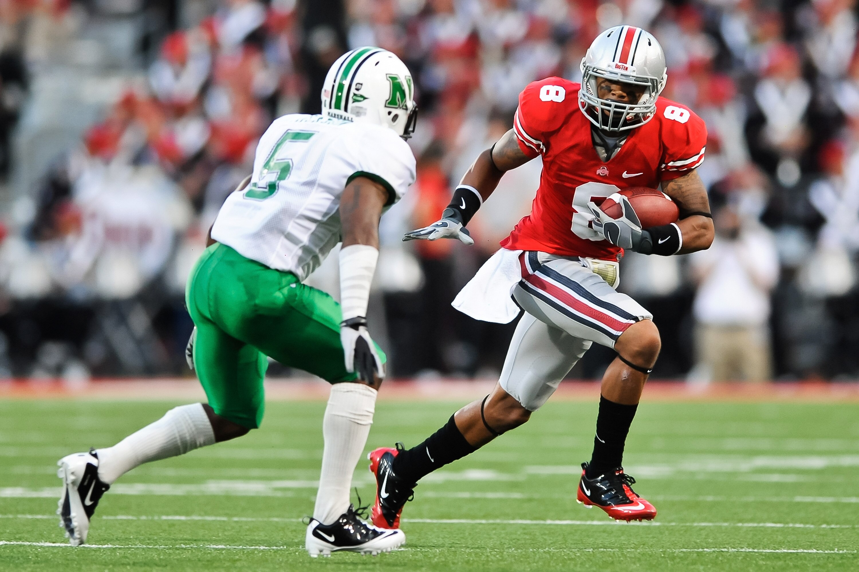 COLUMBUS, OH - SEPTEMBER 2: DeVier Posey #8 of the Ohio State Buckeyes runs with the ball against the the Marshall Thundering Herd at Ohio Stadium on September 2, 2010 in Columbus, Ohio. (Photo by Jamie Sabau/Getty Images)