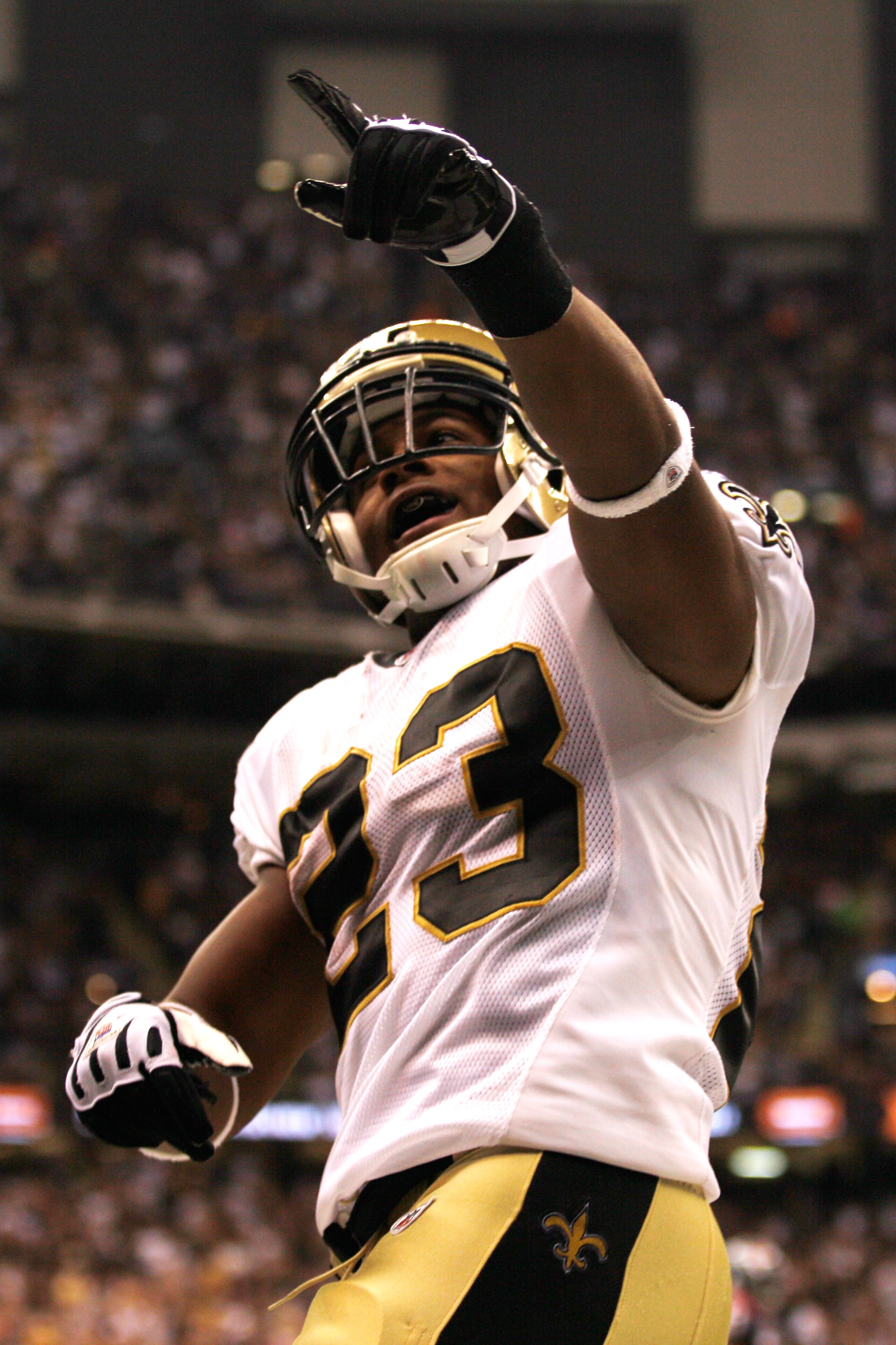 NEW ORLEANS - AUGUST 21:  Pierre Thomas #23 of the New Orleans Saints celebrates after scoring a touchdown against the Houston Texans at the Louisiana Superdome on August 21, 2010 in New Orleans, Louisiana.  (Photo by Chris Graythen/Getty Images)