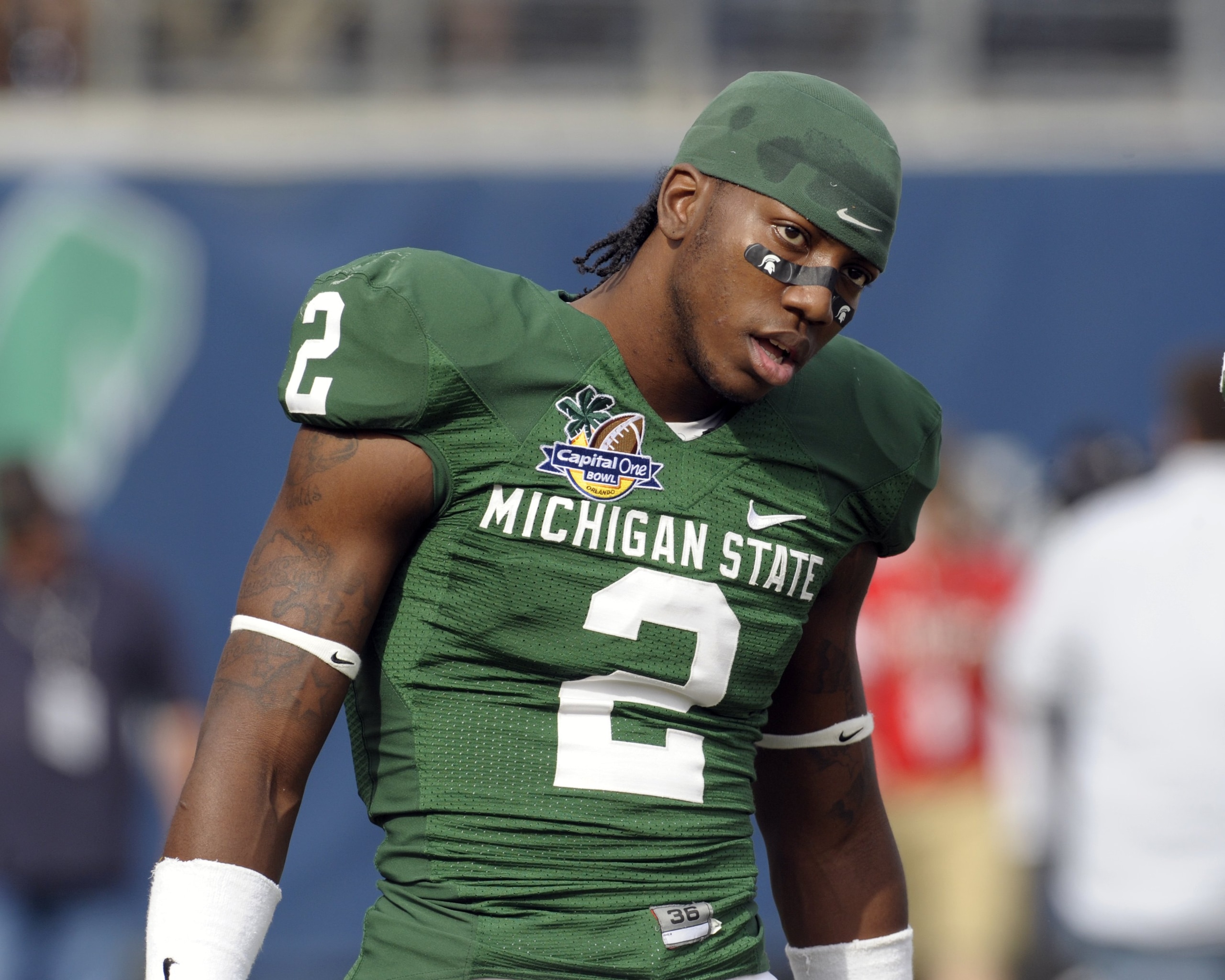 ORLANDO, FL - JANUARY 1: Wide receiver Mark Dell #2 of the Michigan State Spartans looks for a warmup pass before play against the Georgia Bulldogs at the 2009 Capital One Bowl at the Citrus Bowl on January 1, 2009 in Orlando, Florida.  (Photo by Al Messe