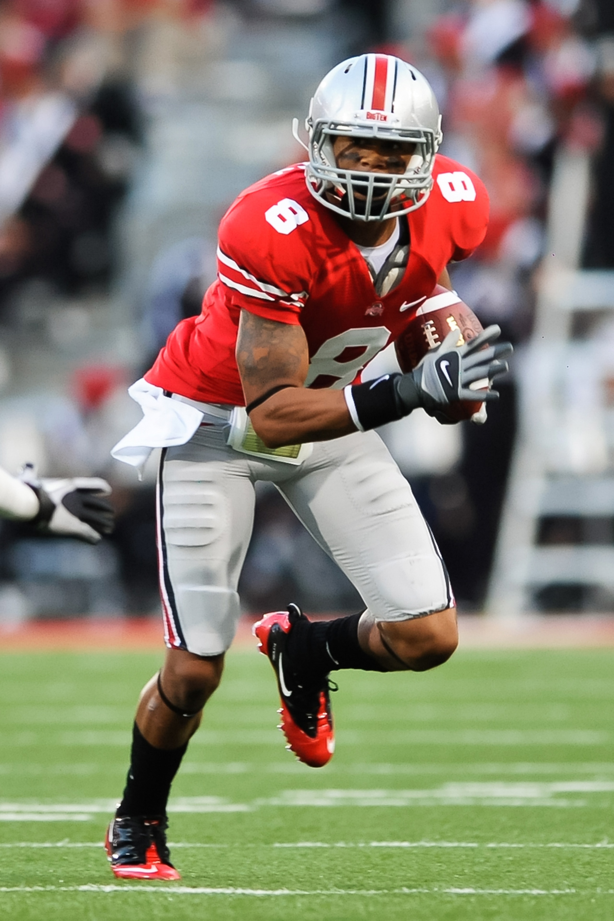 COLUMBUS, OH - SEPTEMBER 2: DeVier Posey #8 of the Ohio State Buckeyes runs with the ball against the the Marshall Thundering Herd at Ohio Stadium on September 2, 2010 in Columbus, Ohio. (Photo by Jamie Sabau/Getty Images)