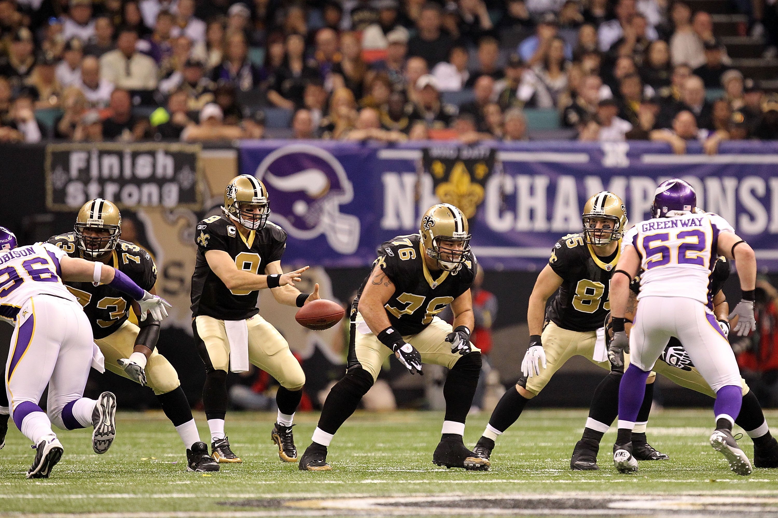 NEW ORLEANS - JANUARY 24:  Drew Brees #9 of the New Orleans Saints receives the snap in the shotgun formation against the Minnesota Vikings during the NFC Championship Game at the Louisana Superdome on January 24, 2010 in New Orleans, Louisiana. The Saint