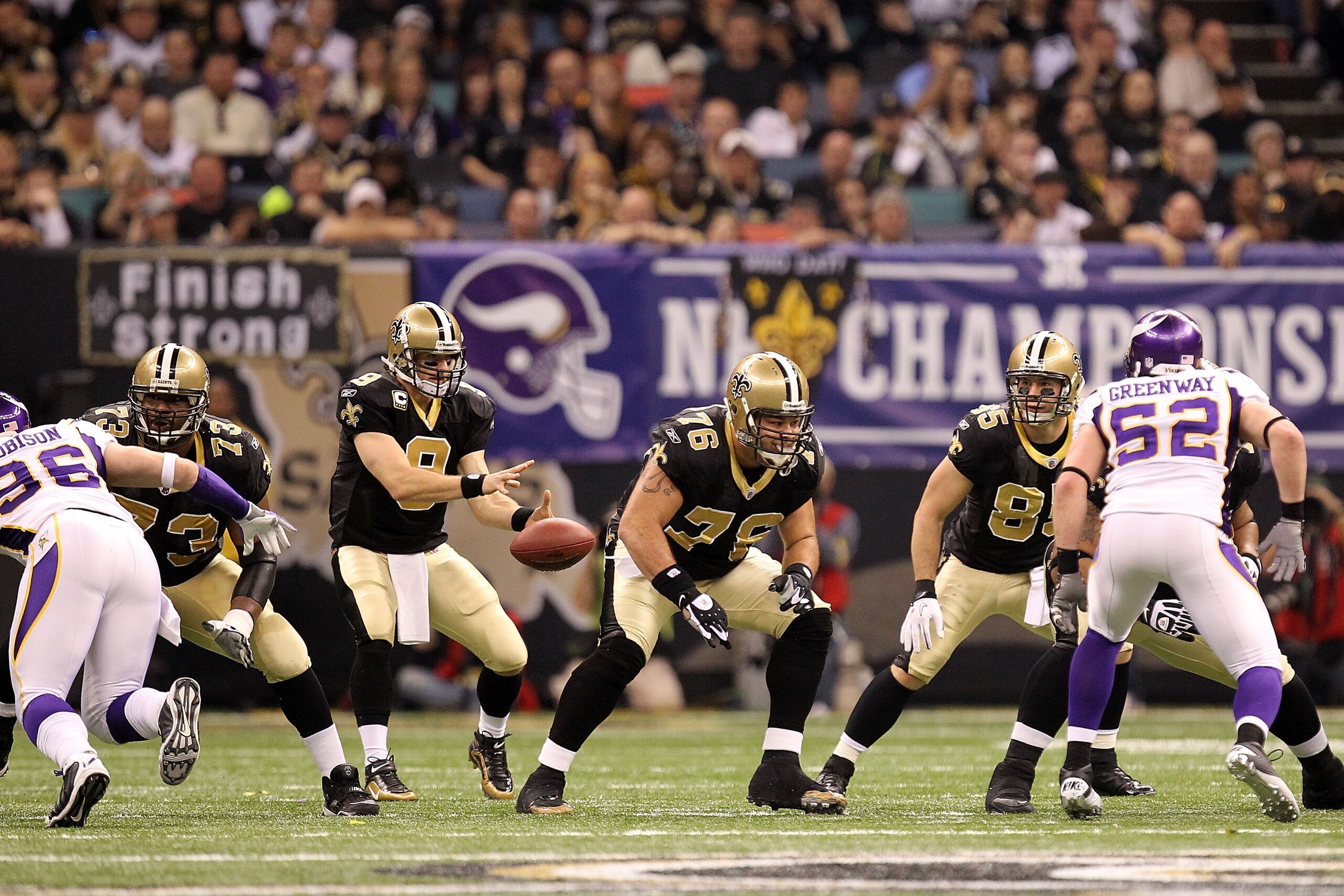 NEW ORLEANS - JANUARY 24:  Drew Brees #9 of the New Orleans Saints receives the snap in the shotgun formation against the Minnesota Vikings during the NFC Championship Game at the Louisana Superdome on January 24, 2010 in New Orleans, Louisiana. The Saint