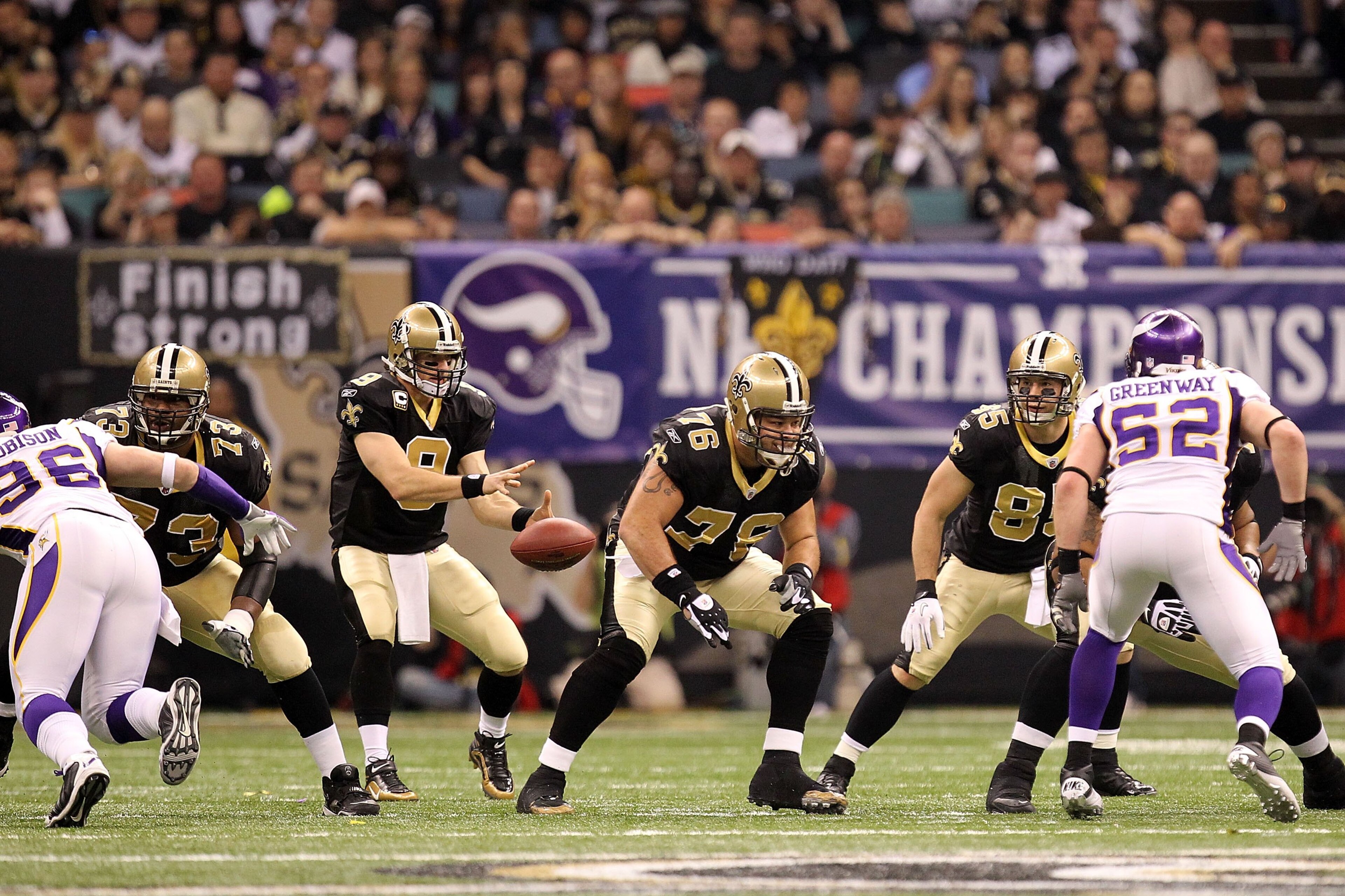 NEW ORLEANS - JANUARY 24:  Drew Brees #9 of the New Orleans Saints receives the snap in the shotgun formation against the Minnesota Vikings during the NFC Championship Game at the Louisana Superdome on January 24, 2010 in New Orleans, Louisiana. The Saint