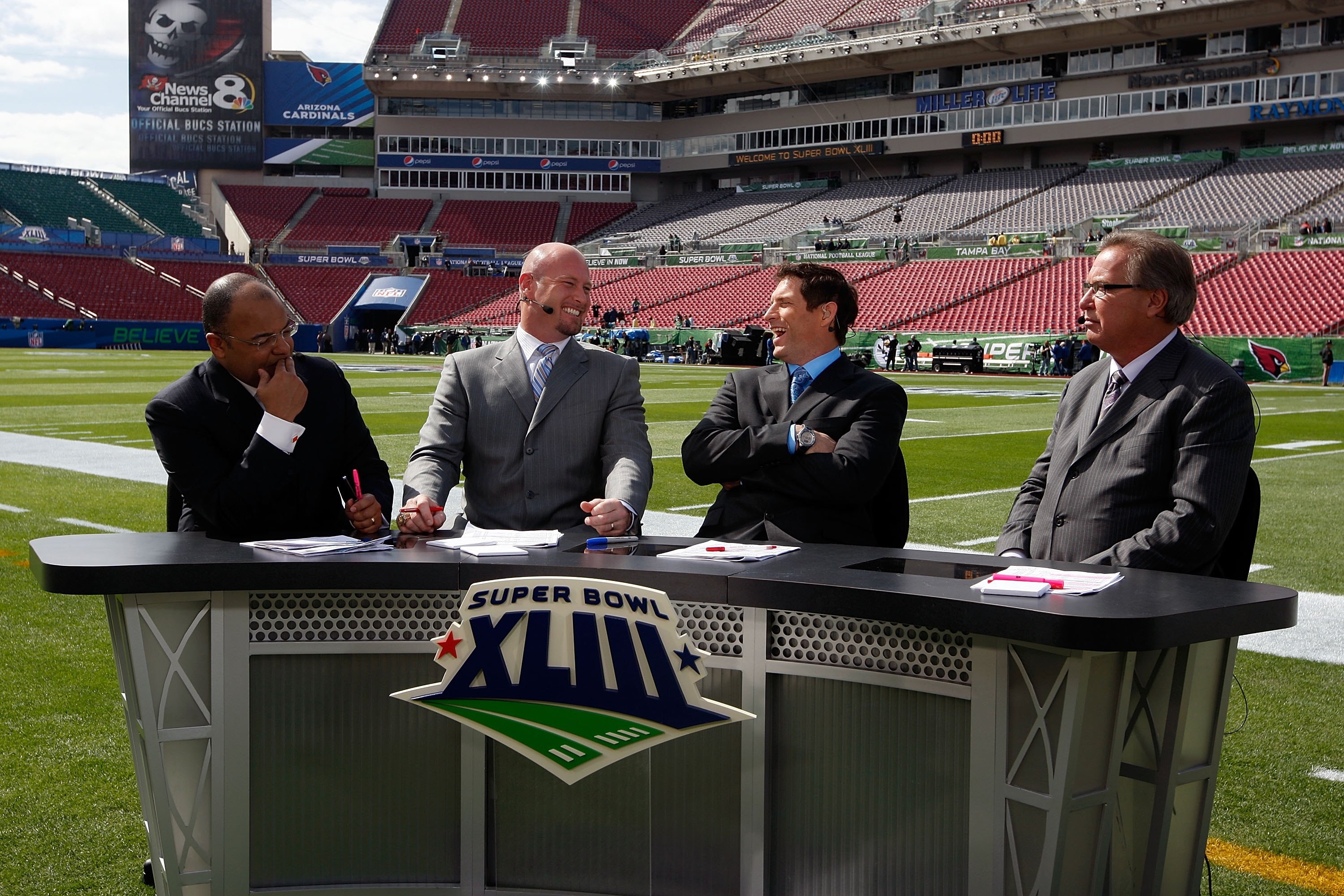 TAMPA, FL - FEBRUARY 01: (L-R) The ESPN pregame show with host Mike Tirico and analysts Trent Dilfer, Steve Young and Ron Jaworski before Super Bowl XLIII on February 1, 2009 at Raymond James Stadium in Tampa, Florida. (Photo by Jamie Squire/Getty Images TAMPA, FL - FEBRUARY 01: (L-R) The ESPN pregame show with host Mike Tirico and analysts Trent Dilfer, Steve Young and Ron Jaworski before Super Bowl XLIII on February 1, 2009 at Raymond James Stadium in Tampa, Florida. (Photo by Jamie Squire/Getty Images