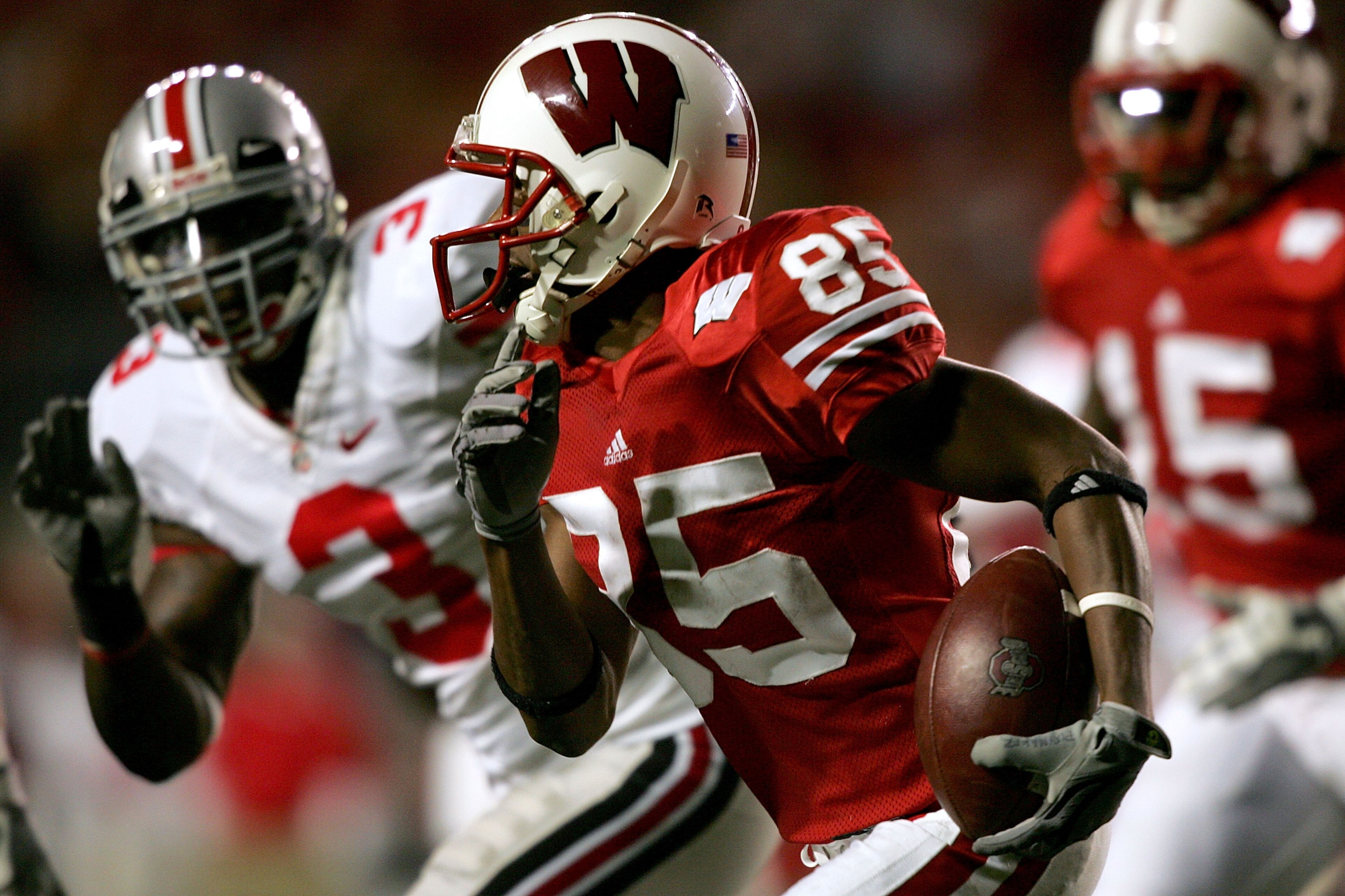 MADISON, WI - OCTOBER 04: David Gilreath #85 of the Wisconsin Badgers returns a kickoff against the Ohio State Buckeyes at Camp Randall Stadium October 4, 2008 in Madison, Wisconsin. (Photo by Matthew Stockman/Getty Images) MADISON, WI - OCTOBER 04: David Gilreath #85 of the Wisconsin Badgers returns a kickoff against the Ohio State Buckeyes at Camp Randall Stadium October 4, 2008 in Madison, Wisconsin. (Photo by Matthew Stockman/Getty Images)