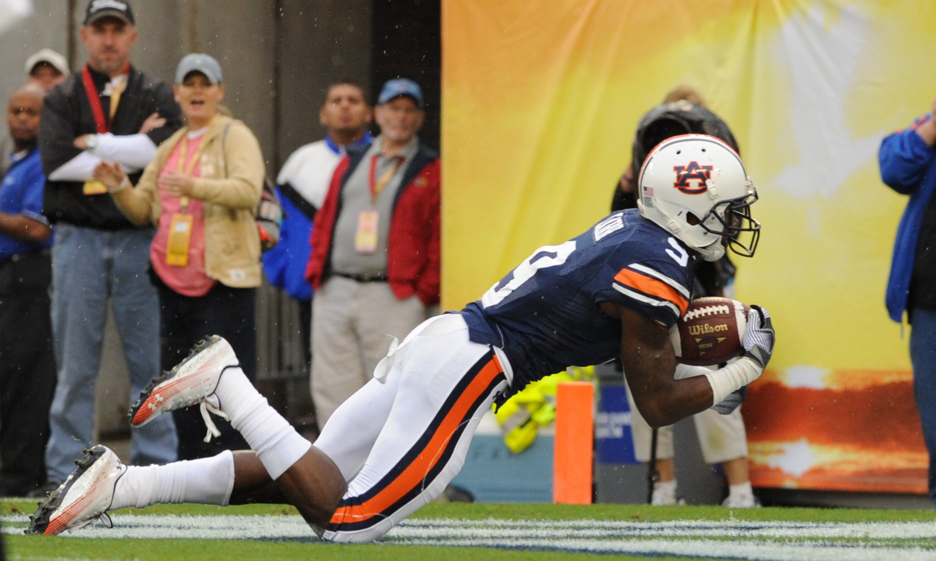 TAMPA, FL - JANUARY 1: QWide receiver Quindarius Carr #9 of the Auburn Tigers dives for a touchdown against the Northwestern Wildcats in the Outback Bowl January 1, 2010 at Raymond James Stadium in Tampa, Florida.  (Photo by Al Messerschmidt/Getty Images)
