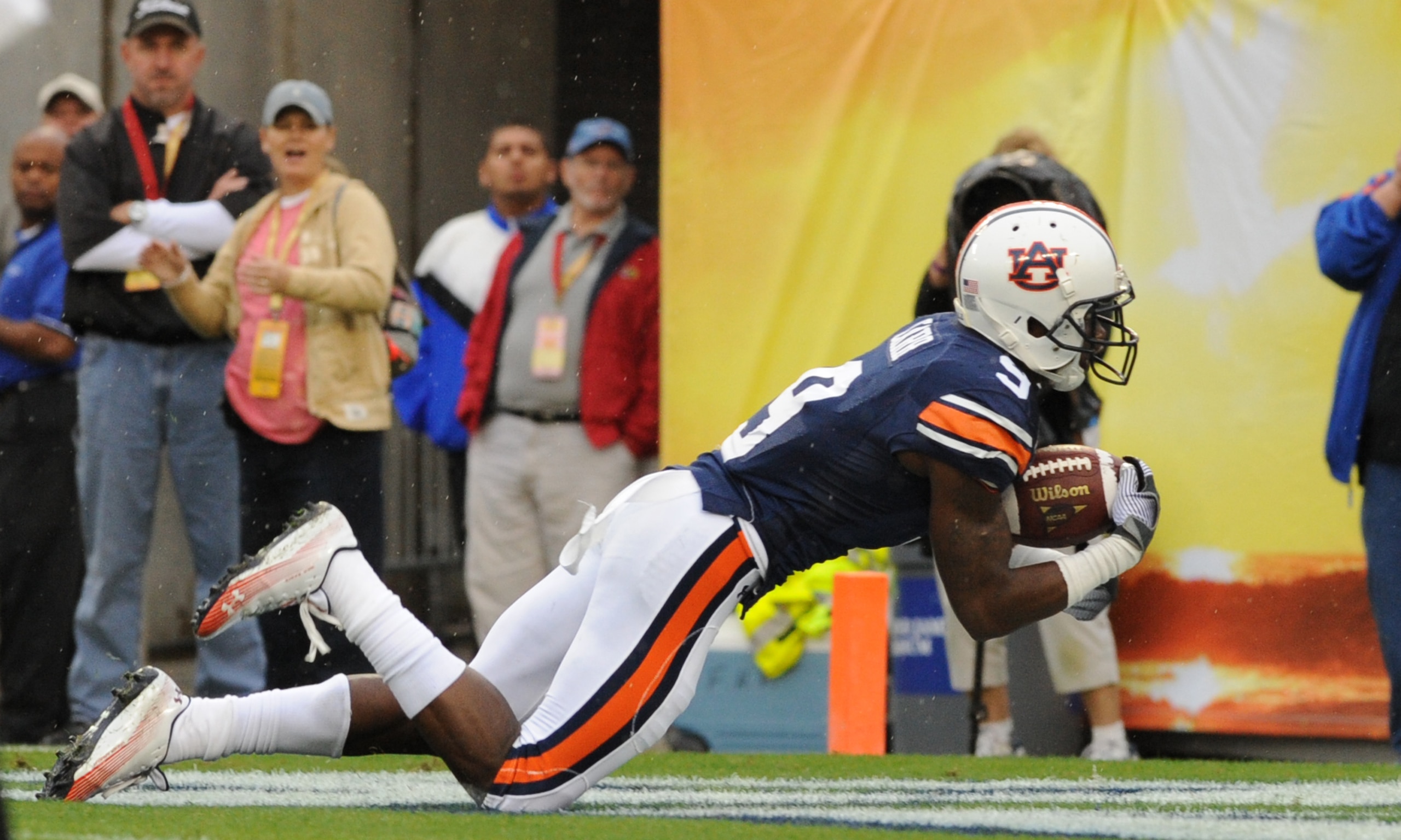 TAMPA, FL - JANUARY 1: QWide receiver Quindarius Carr #9 of the Auburn Tigers dives for a touchdown against the Northwestern Wildcats in the Outback Bowl January 1, 2010 at Raymond James Stadium in Tampa, Florida.  (Photo by Al Messerschmidt/Getty Images)