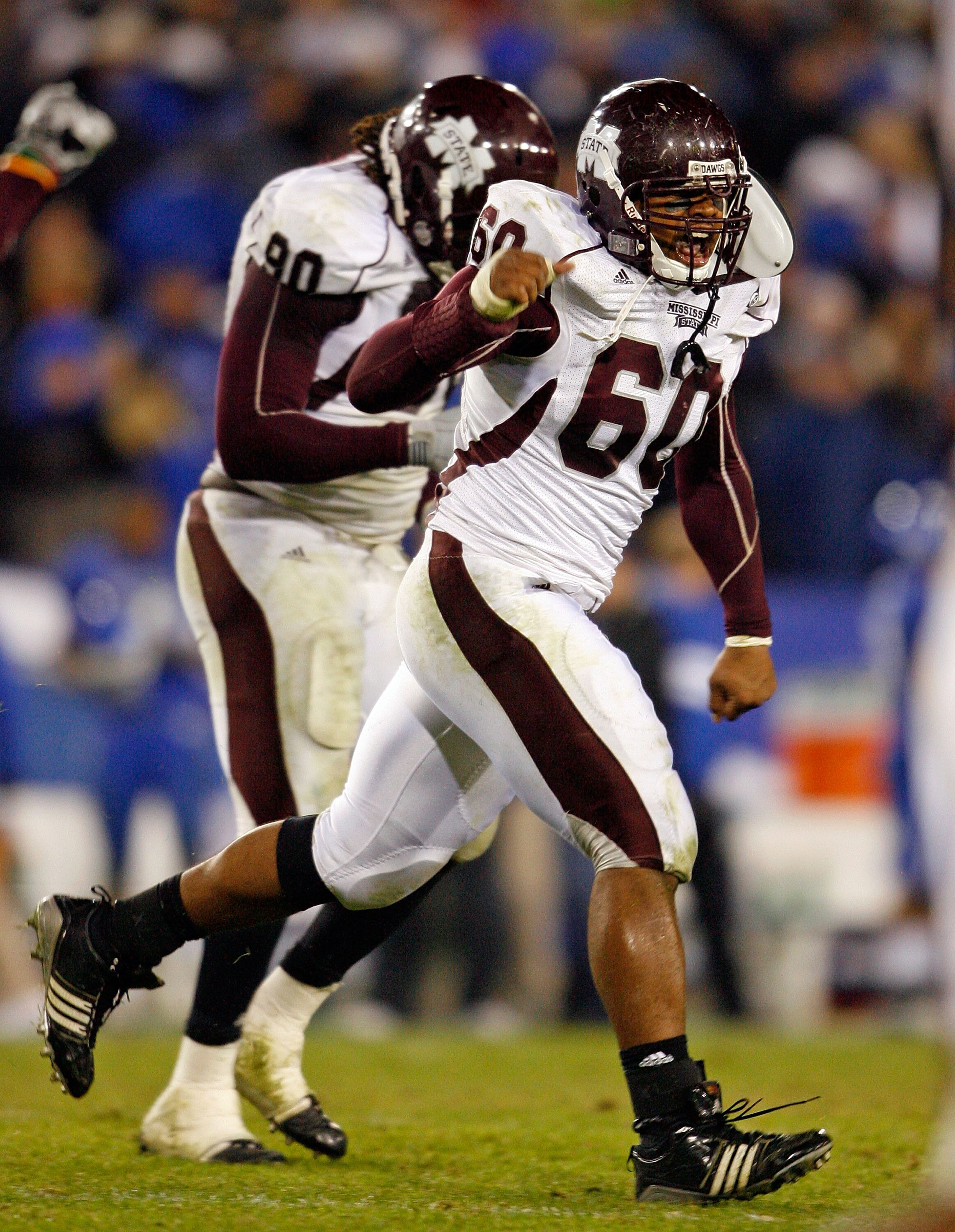 LEXINGTON, KY - OCTOBER 31:  Devin Jones #60 of  the Mississippi State Bulldogs celebrates after stopping the Kentucky Wildcats on fourth down on their last series of the game at Commonwealth Stadium on October 31, 2009 in Lexington, Kentucky.  (Photo by 