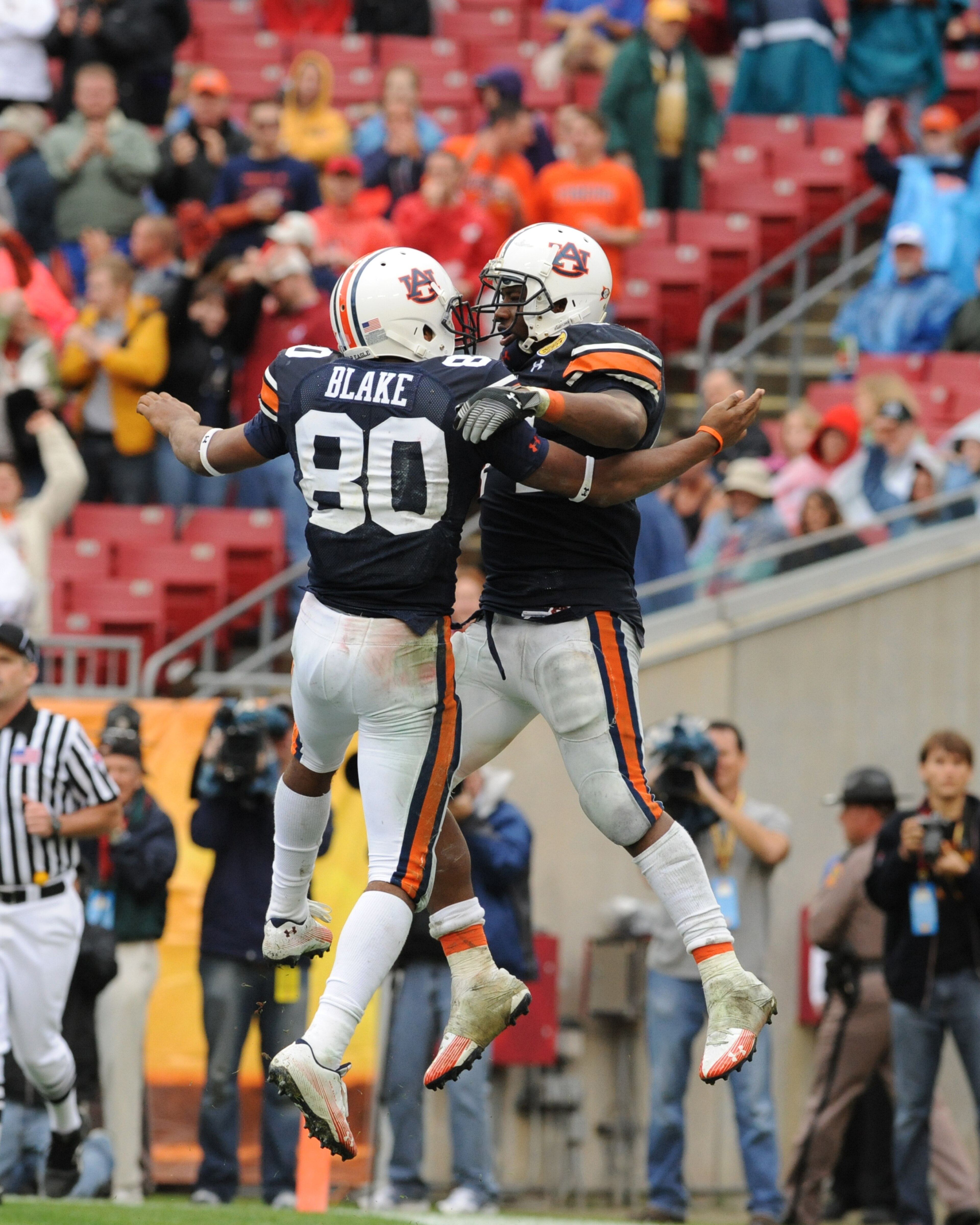 TAMPA, FL - JANUARY 1: Running back Ben Tate #44 of the Auburn Tigers rcelebrates a rushing touchdown with wide receiver Emory Blake #80 against the Northwestern Wildcats in the Outback Bowl January 1, 2010 at Raymond James Stadium in Tampa, Florida.  (Ph