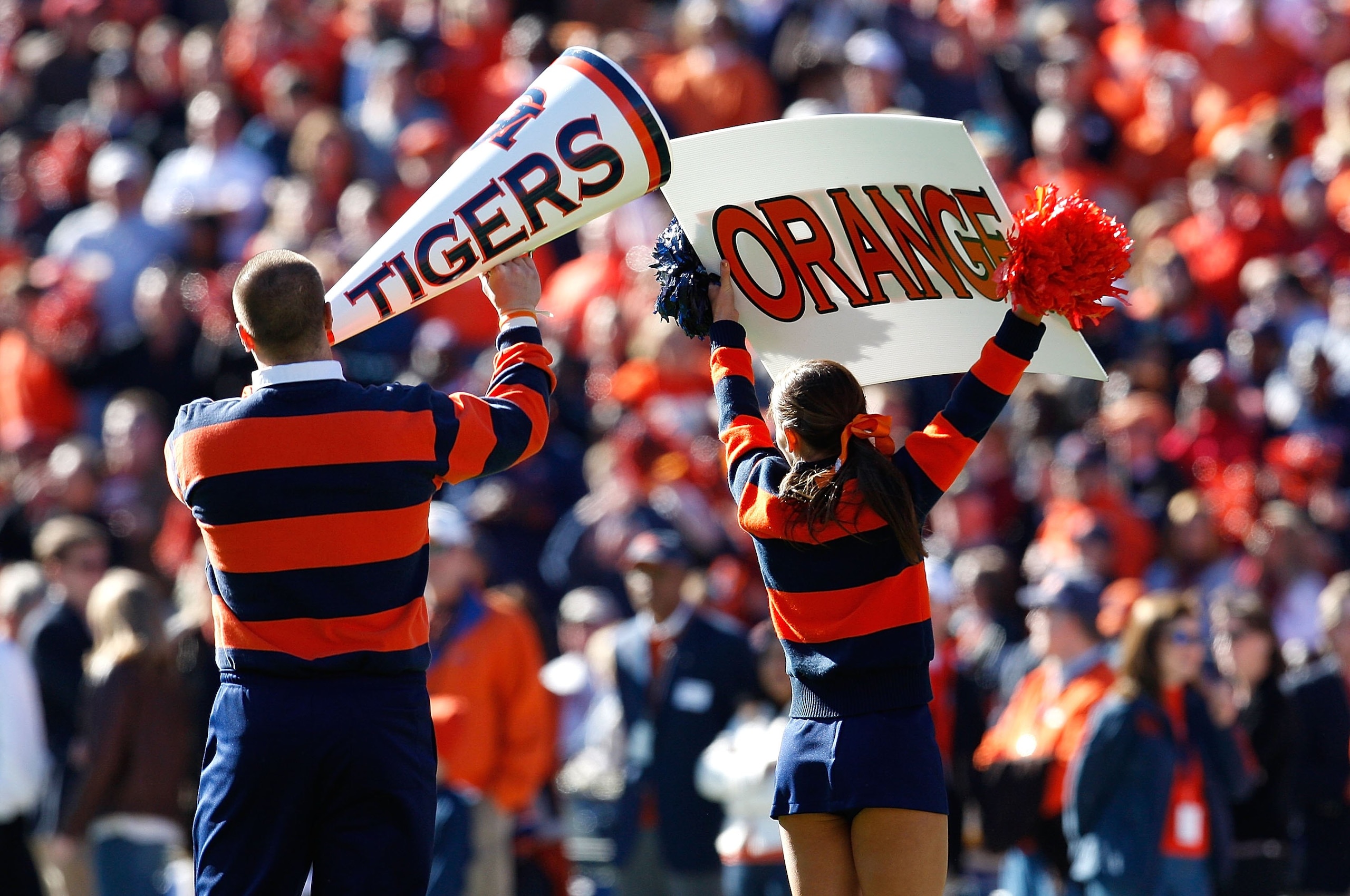 AUBURN, AL - NOVEMBER 27:  Cheerleaders for the Auburn Tigers peform before the game against the Alabama Crimson Tide at Jordan-Hare Stadium on November 27, 2009 in Auburn, Alabama.  (Photo by Kevin C. Cox/Getty Images)