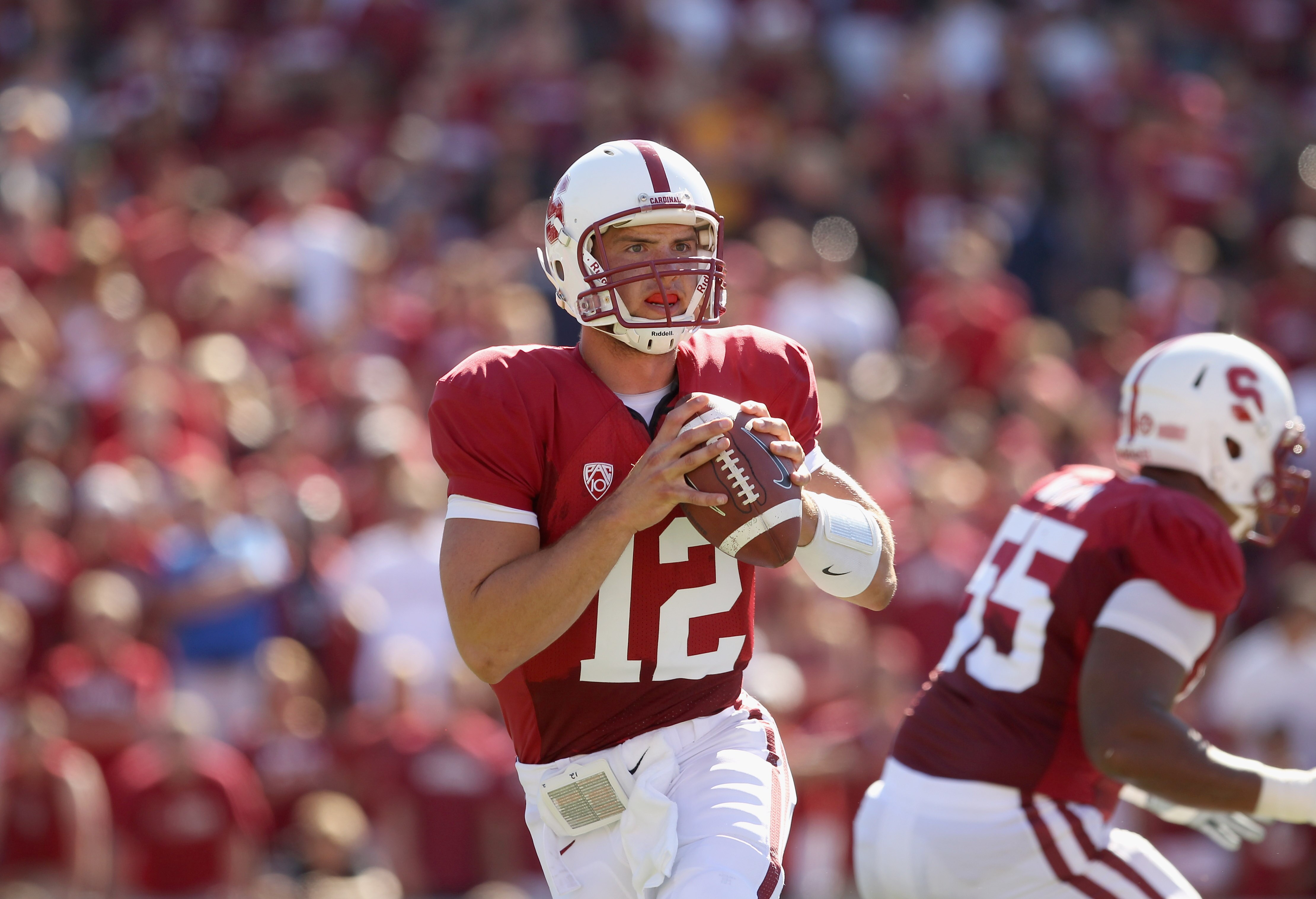 PALO ALTO, CA - SEPTEMBER 04:  Andrew Luck #12 of the Stanford Cardinal in action during their game against the Sacramento State Hornets at Stanford Stadium on September 4, 2010 in Palo Alto, California.  (Photo by Ezra Shaw/Getty Images)