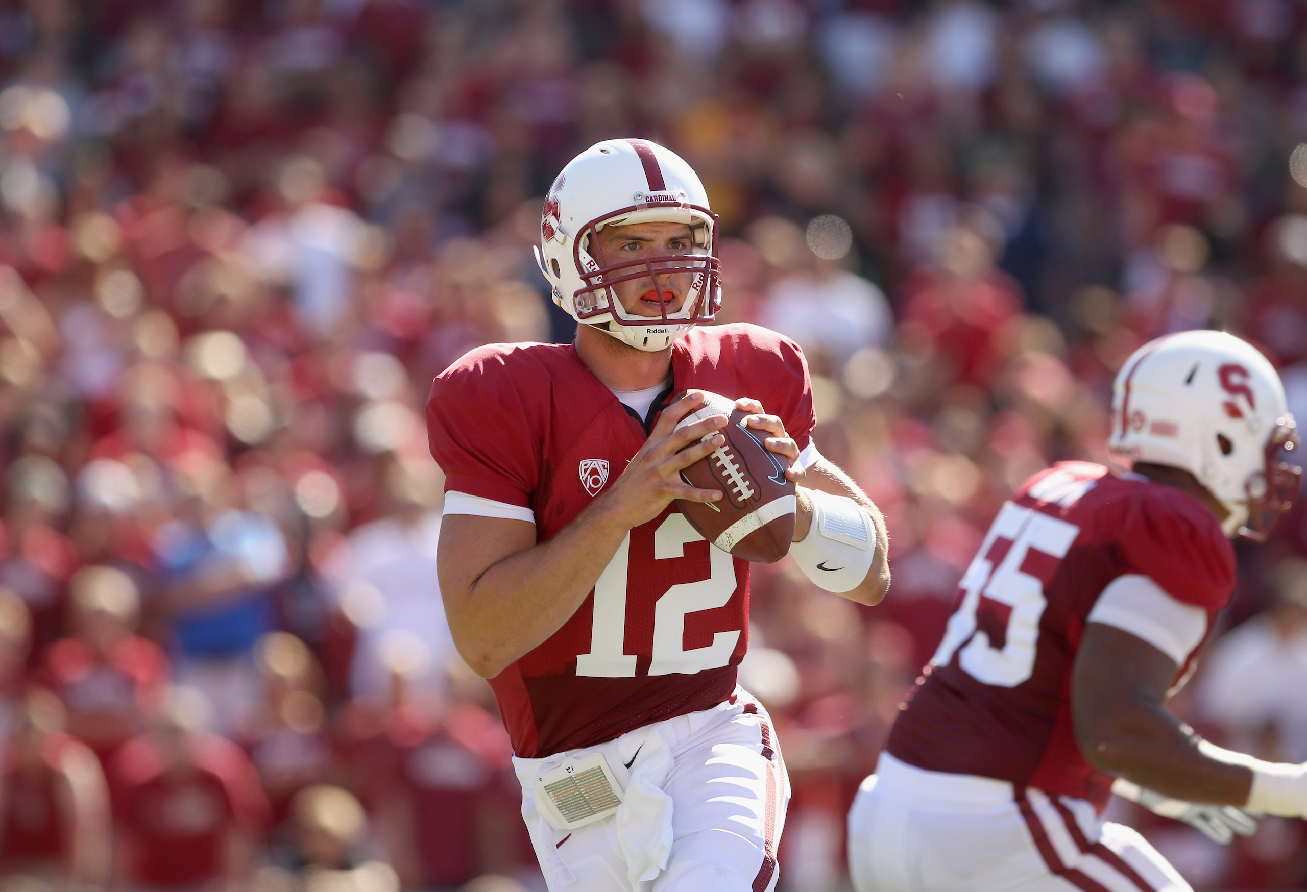 PALO ALTO, CA - SEPTEMBER 04:  Andrew Luck #12 of the Stanford Cardinal in action during their game against the Sacramento State Hornets at Stanford Stadium on September 4, 2010 in Palo Alto, California.  (Photo by Ezra Shaw/Getty Images)