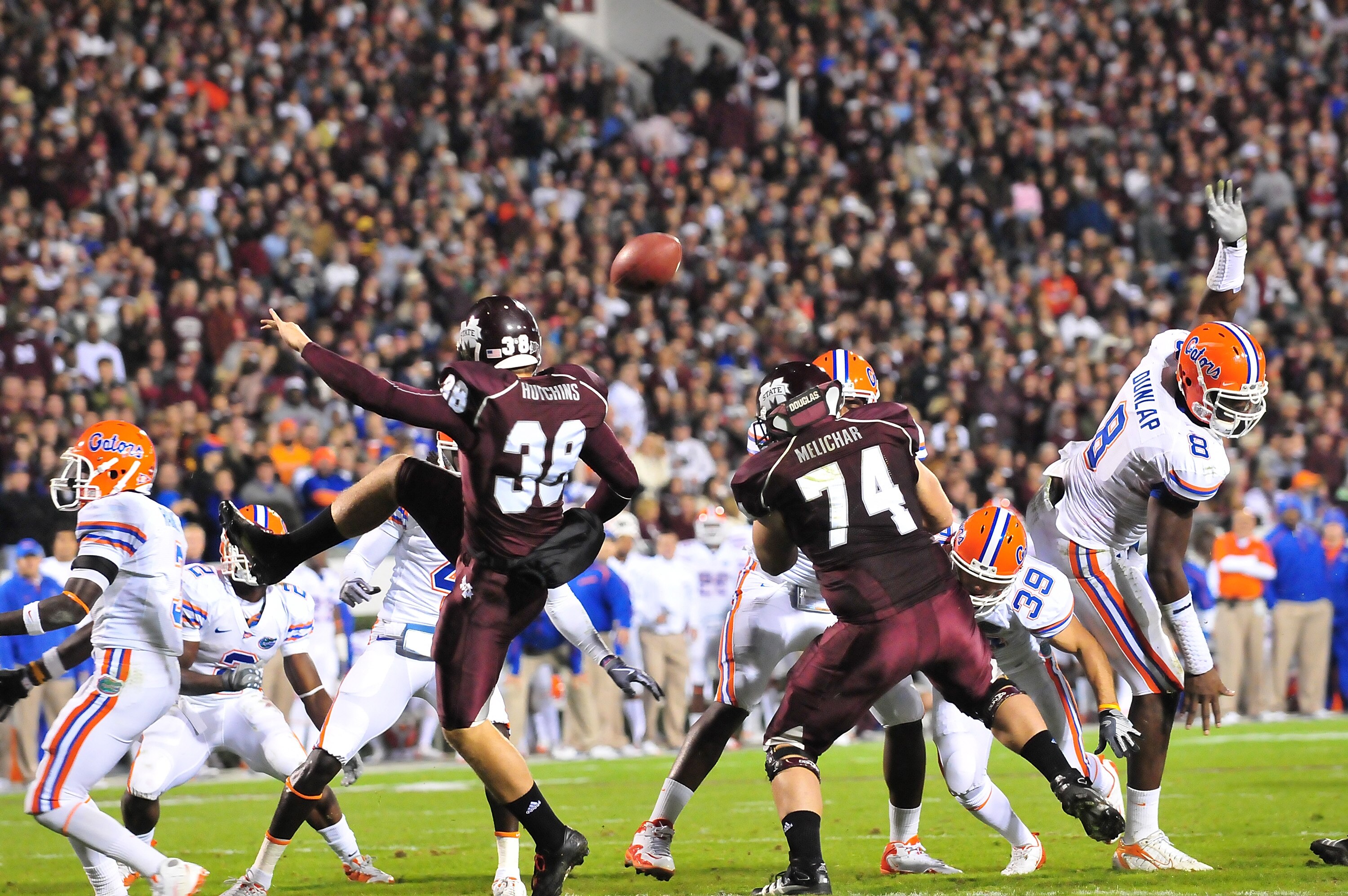 STARKVILLE, MS - OCTOBER 24:  Punter Heath Hutchins # 38 of the Mississippi State Bulldogs has a punt blocked by the Florida Gators, at Davis Wade Stadium on  October 24, 2009 in Starkville, Mississippi  (Photo by Rick Dole/Getty Images)