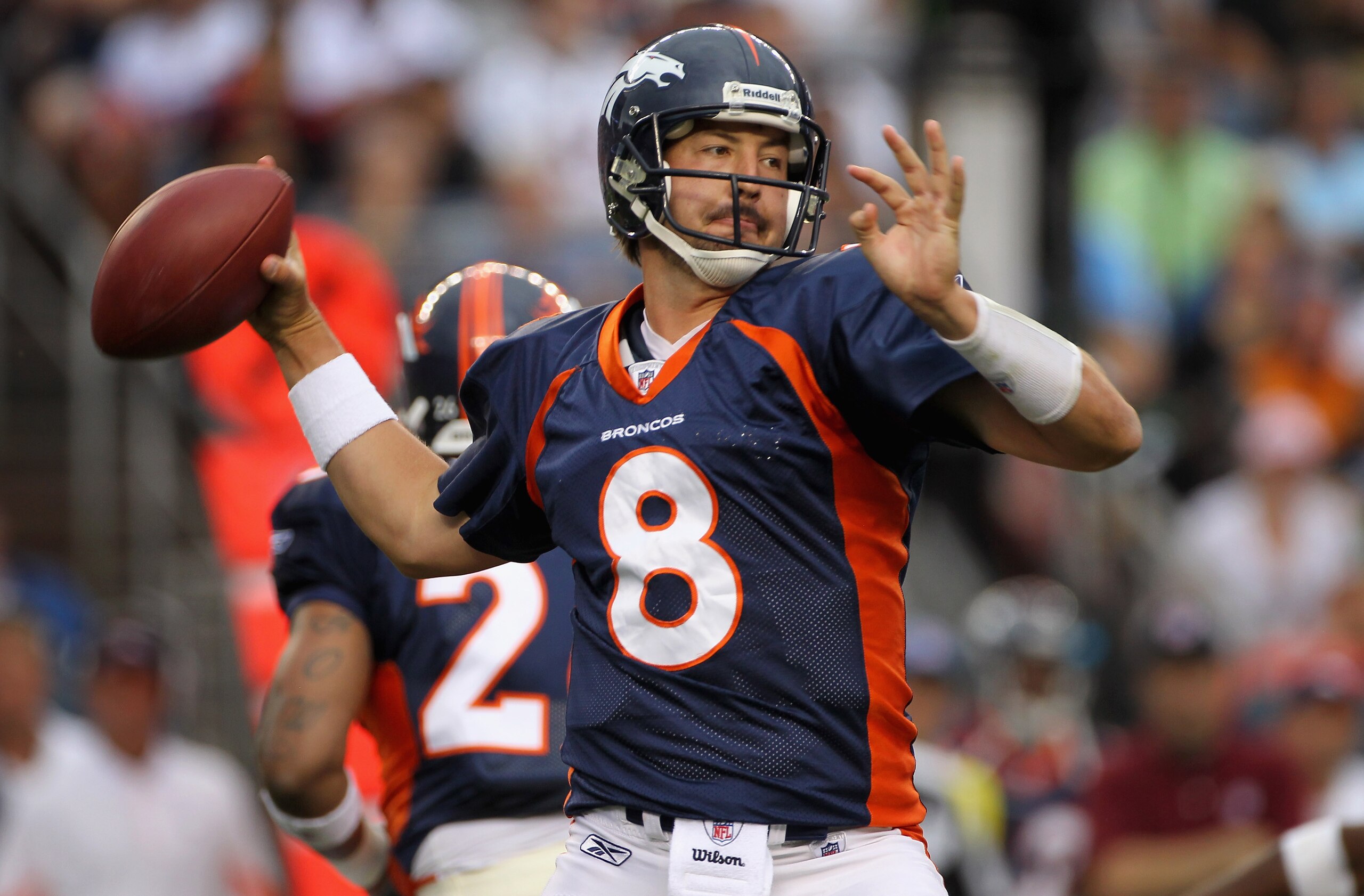 DENVER - AUGUST 29:  Quarterback Kyle Orton #8 of the Denver Broncos delivers a pass against the Pittsburgh Steelers during preseason NFL action at INVESCO Field at Mile High on August 29, 2010 in Denver, Colorado.  (Photo by Doug Pensinger/Getty Images)